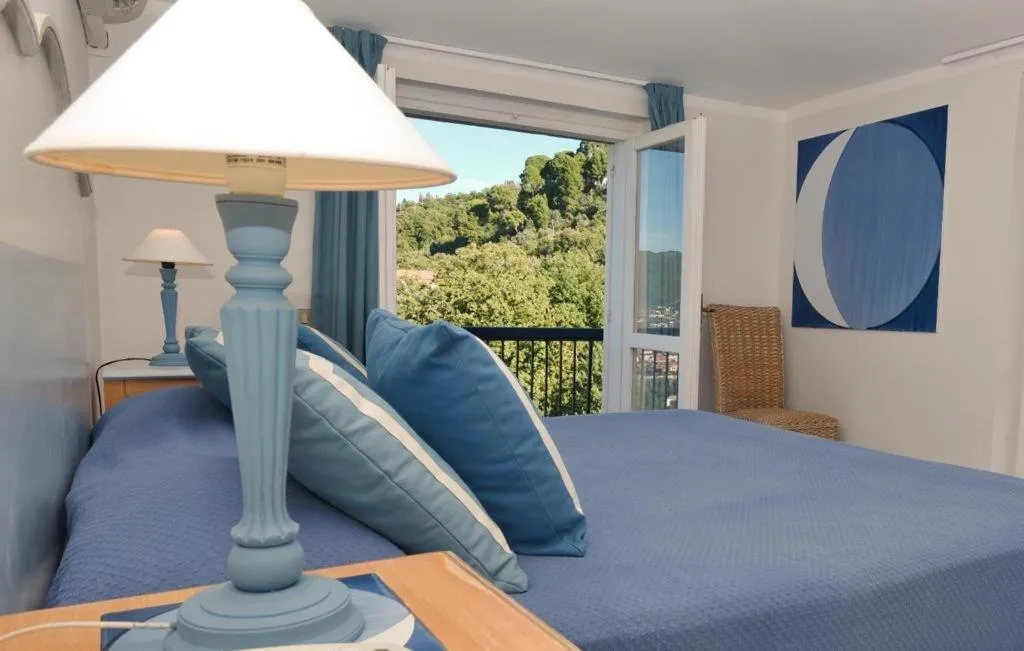 Bed in Hotel Garden Riviera