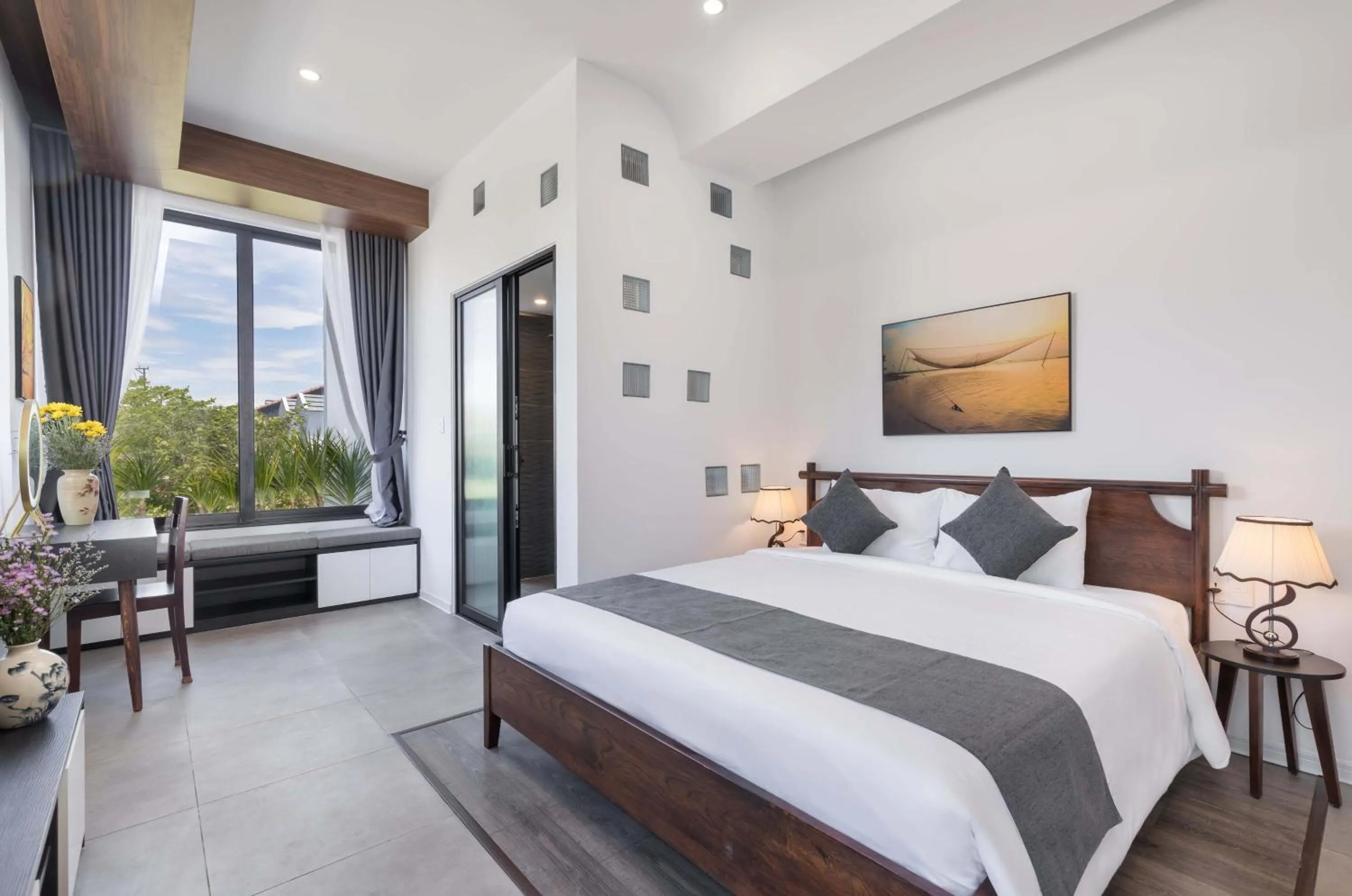 Bed in Charm Champion Villa Hoian