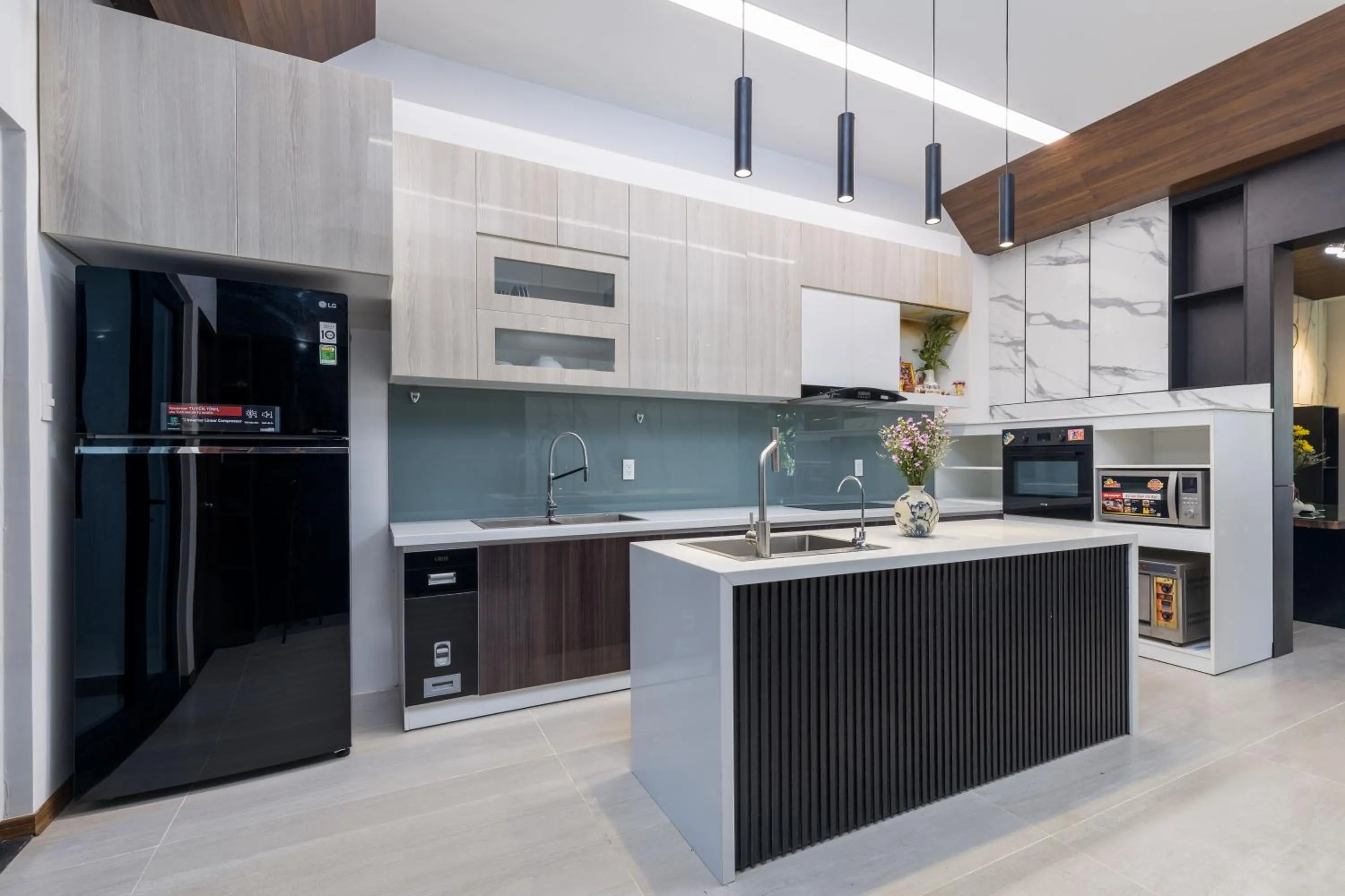 Communal kitchen in Charm Champion Villa Hoian