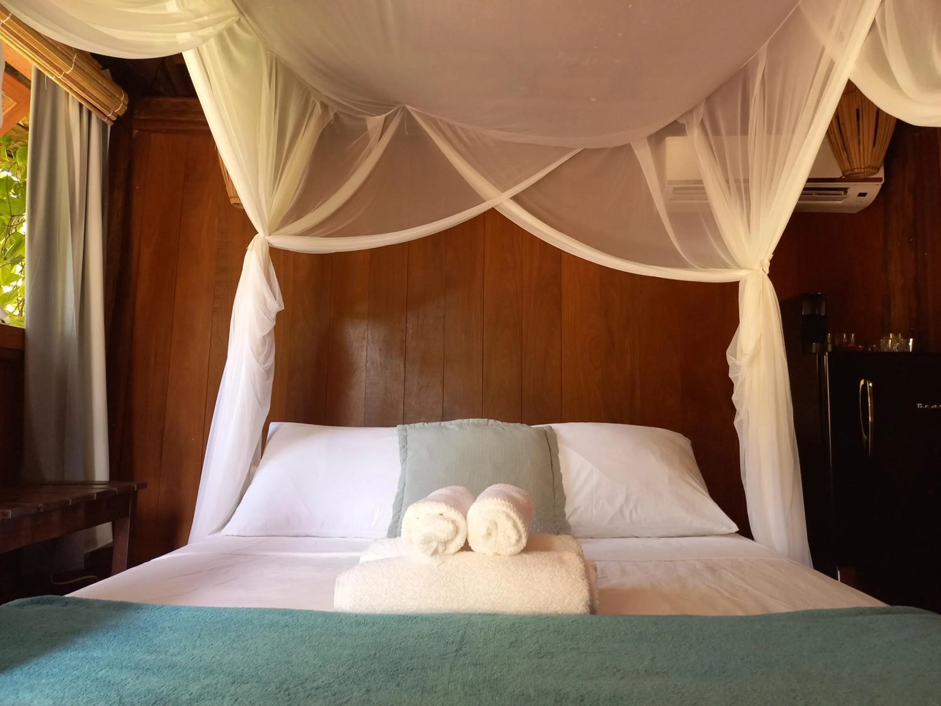 Bed in Bangalôs da Aldeia Caraiva