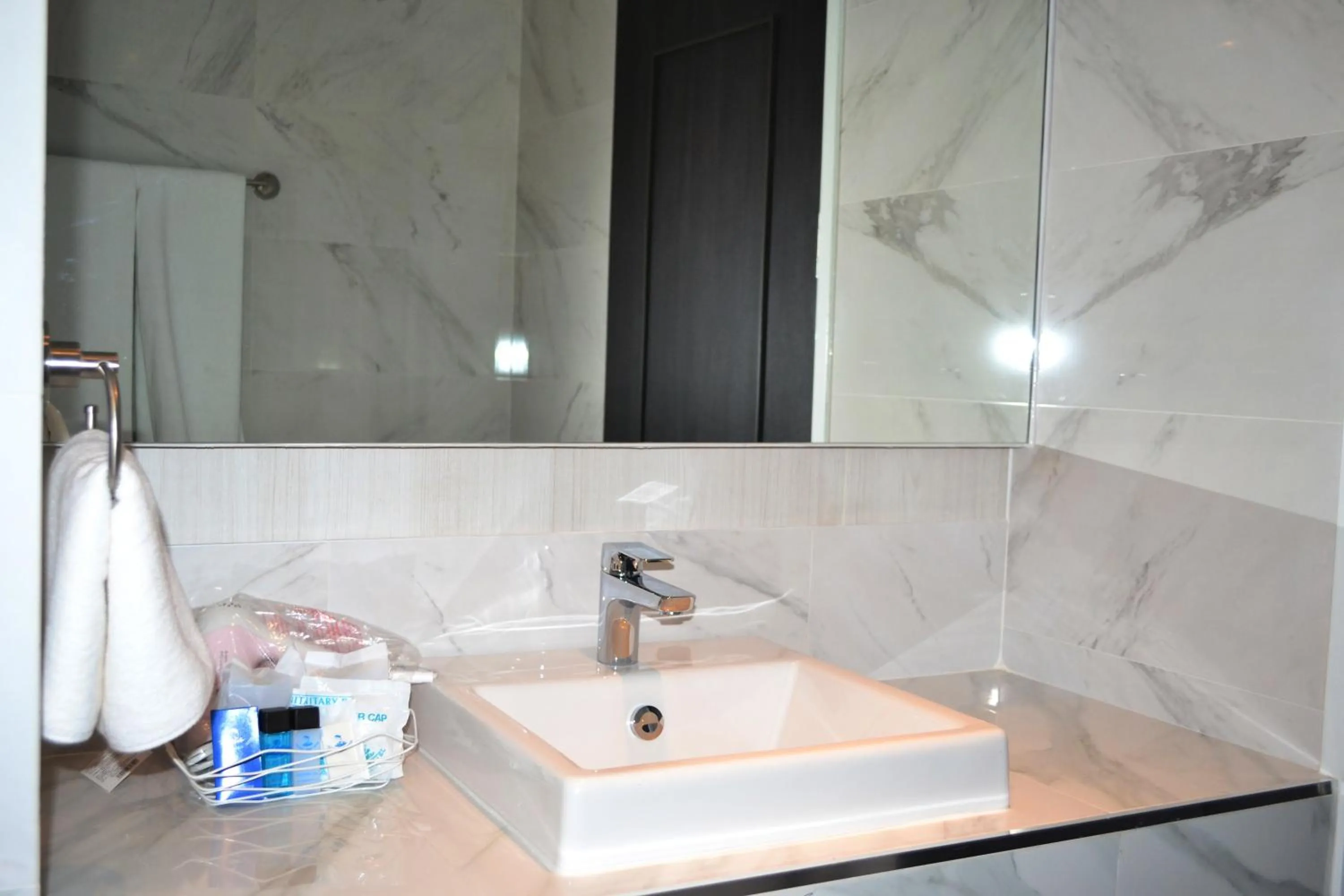 Bathroom in Flipper Lodge Hotel - SHA Extra Plus