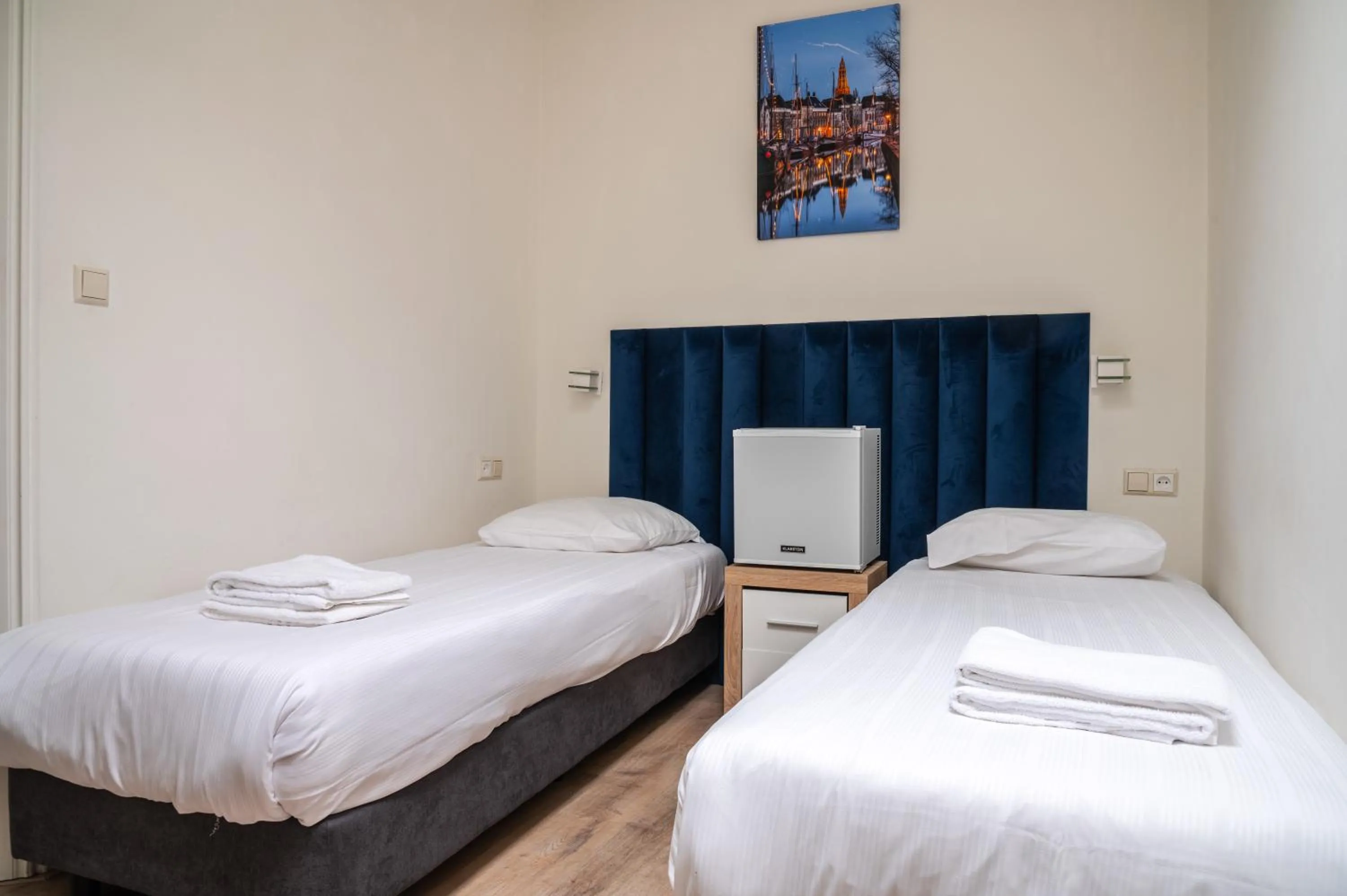 Bed in Hotel Kap City Centre