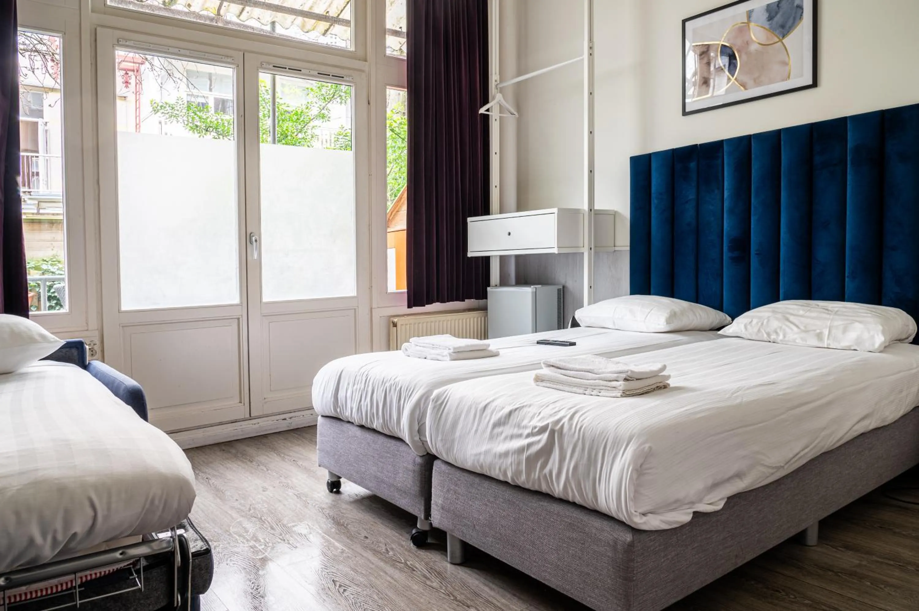 Bed in Hotel Kap City Centre