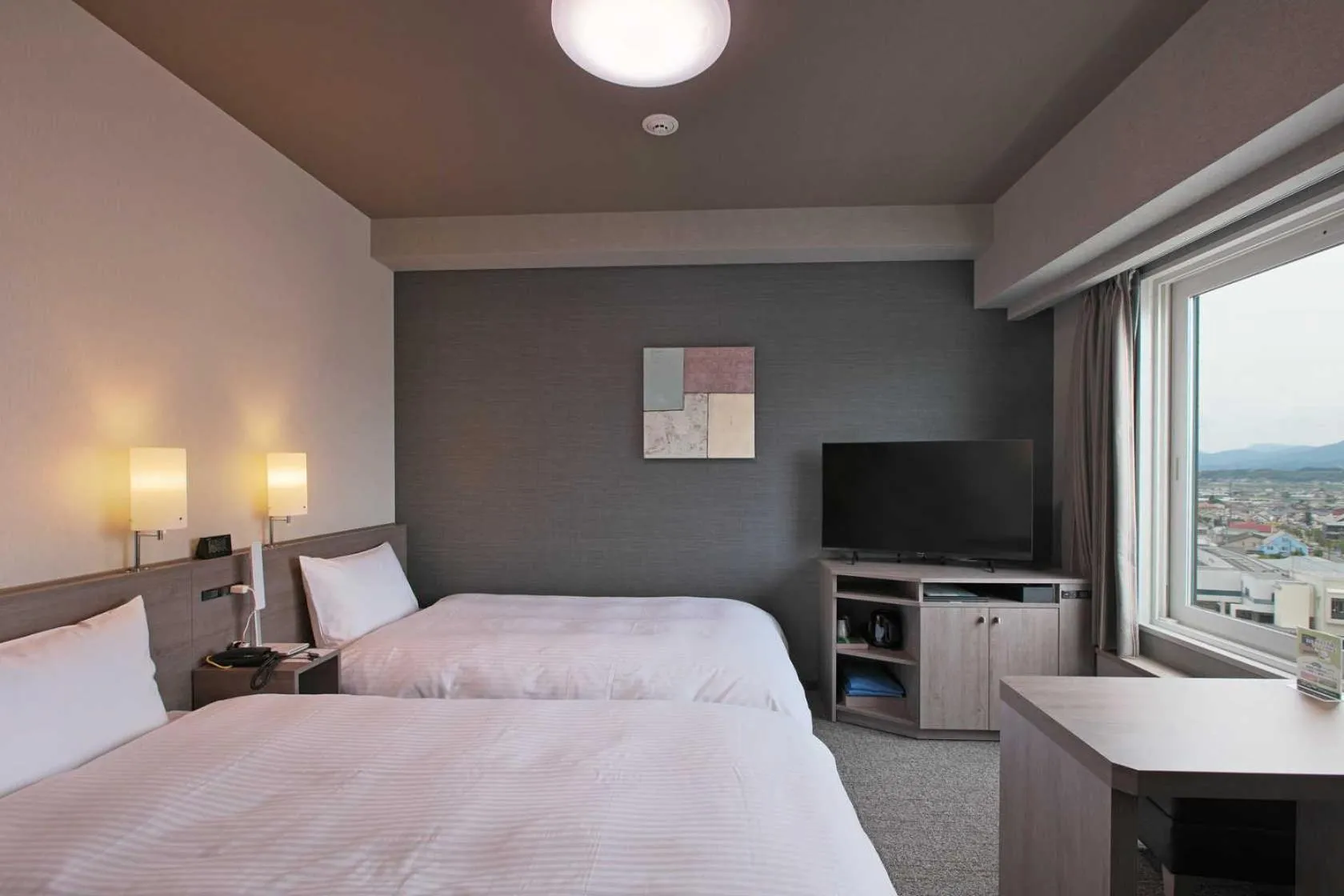 Photo of the whole room, Bed in Hotel Route Inn Grand Nakano Obuse