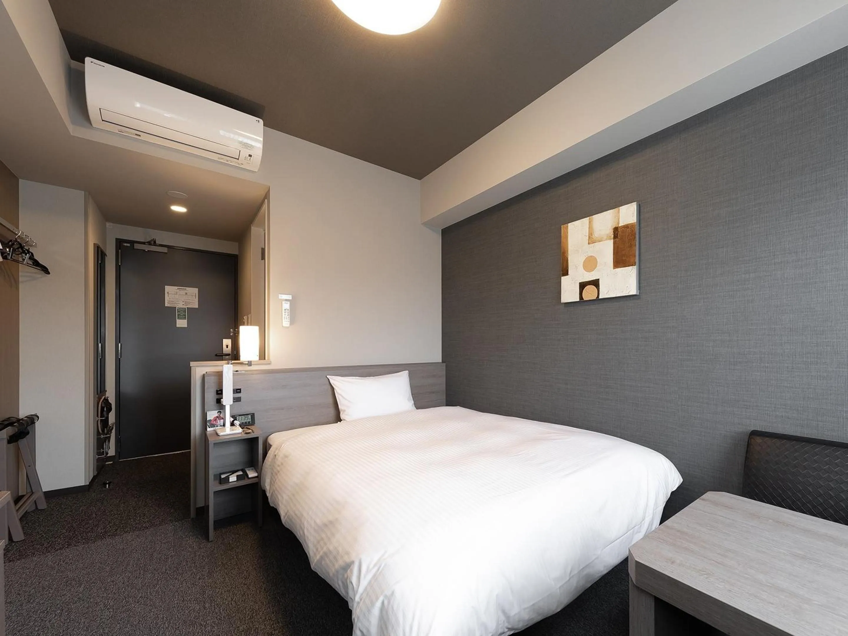 Photo of the whole room, Bed in Hotel Route Inn Kyoto Kameoka Ekimae