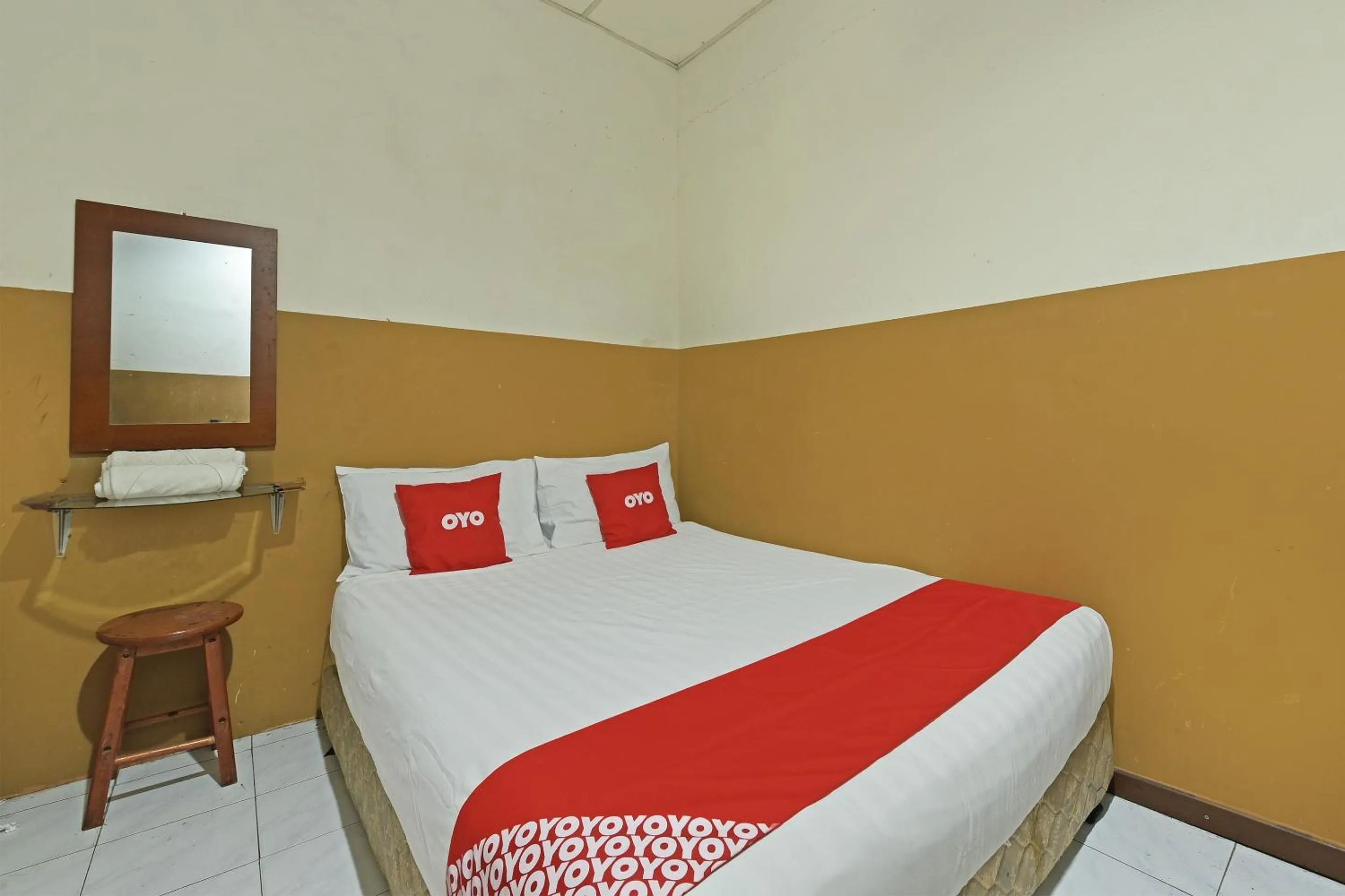 Bedroom in OYO 90794 Maple Hotel