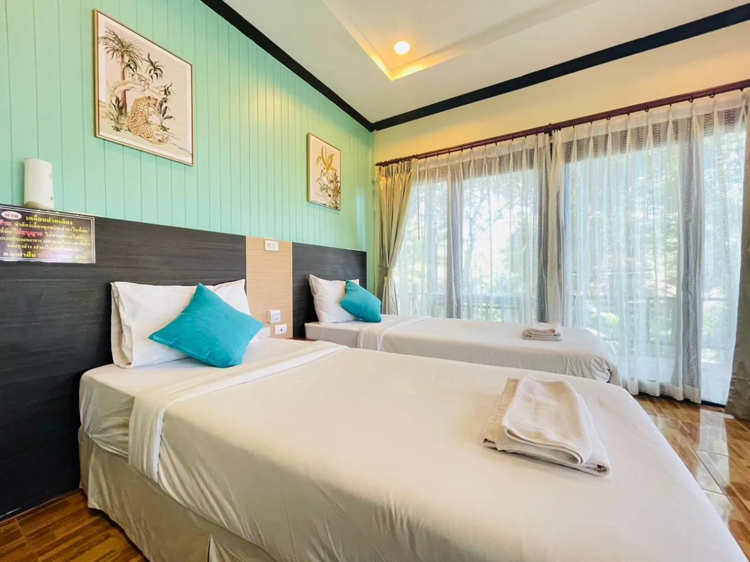 Bed in สงขลาคีรี รีสอร์ท SongkhlaKeeree Resort
