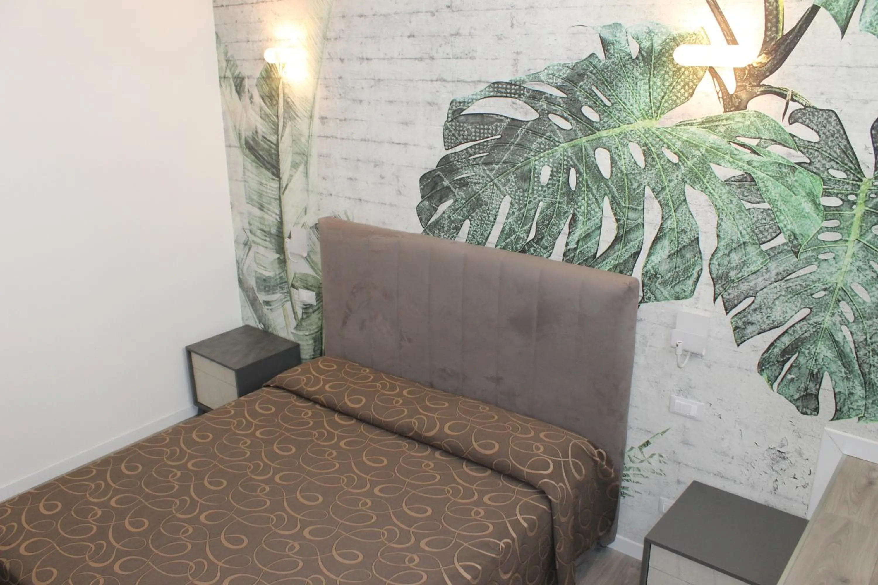 Bed in Hotel Galileo