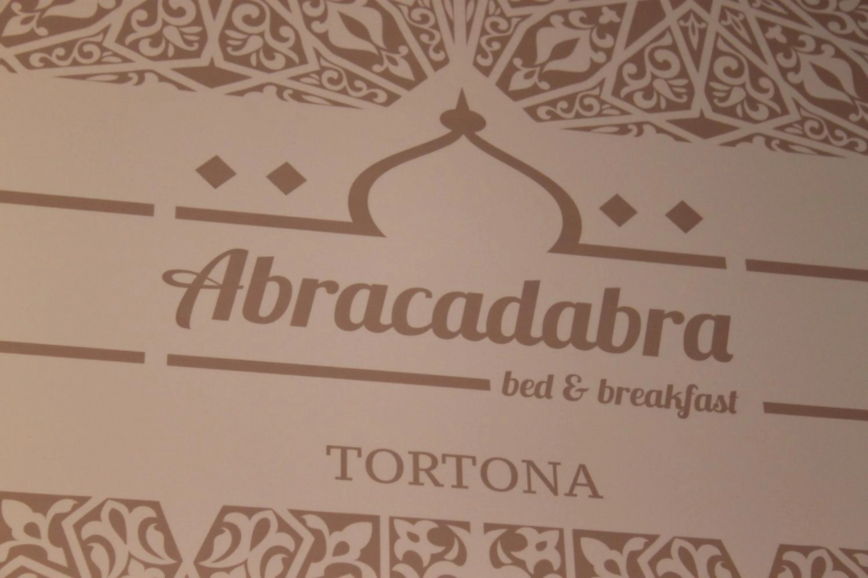 Property logo or sign in Abracadabra Tortona