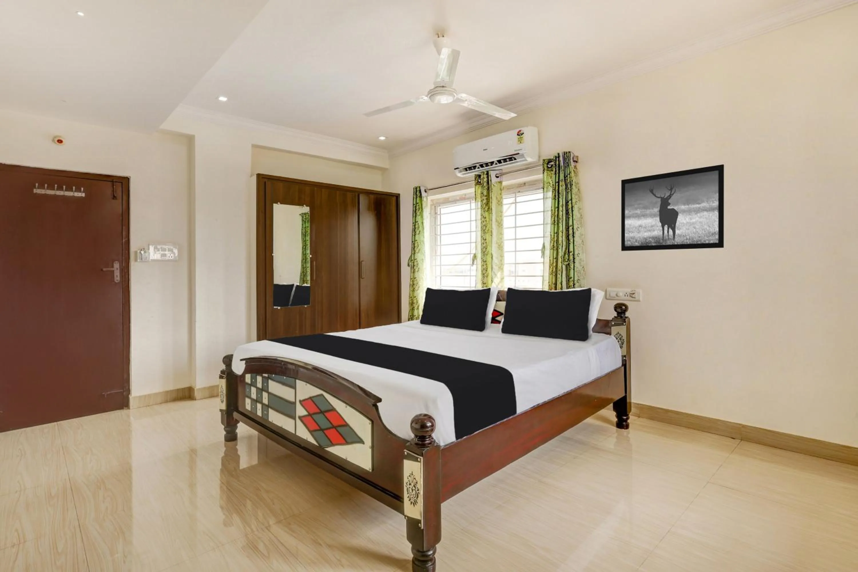 Bedroom, Bed in Super Hotel O Ramaraopet Near Kakinada Beach