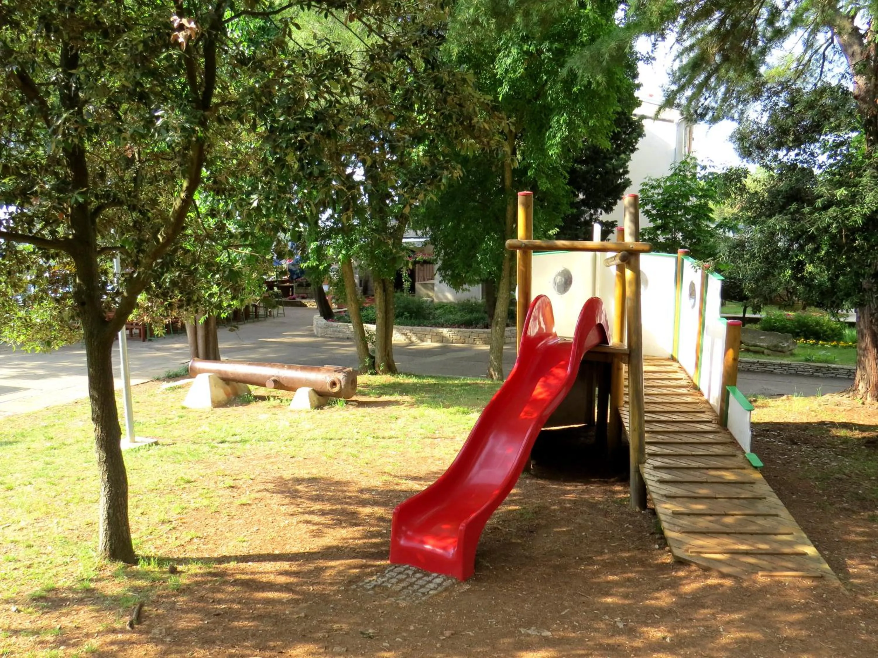 Children play ground in Camping Media Mobile Homes in Brioni Sunny Camping