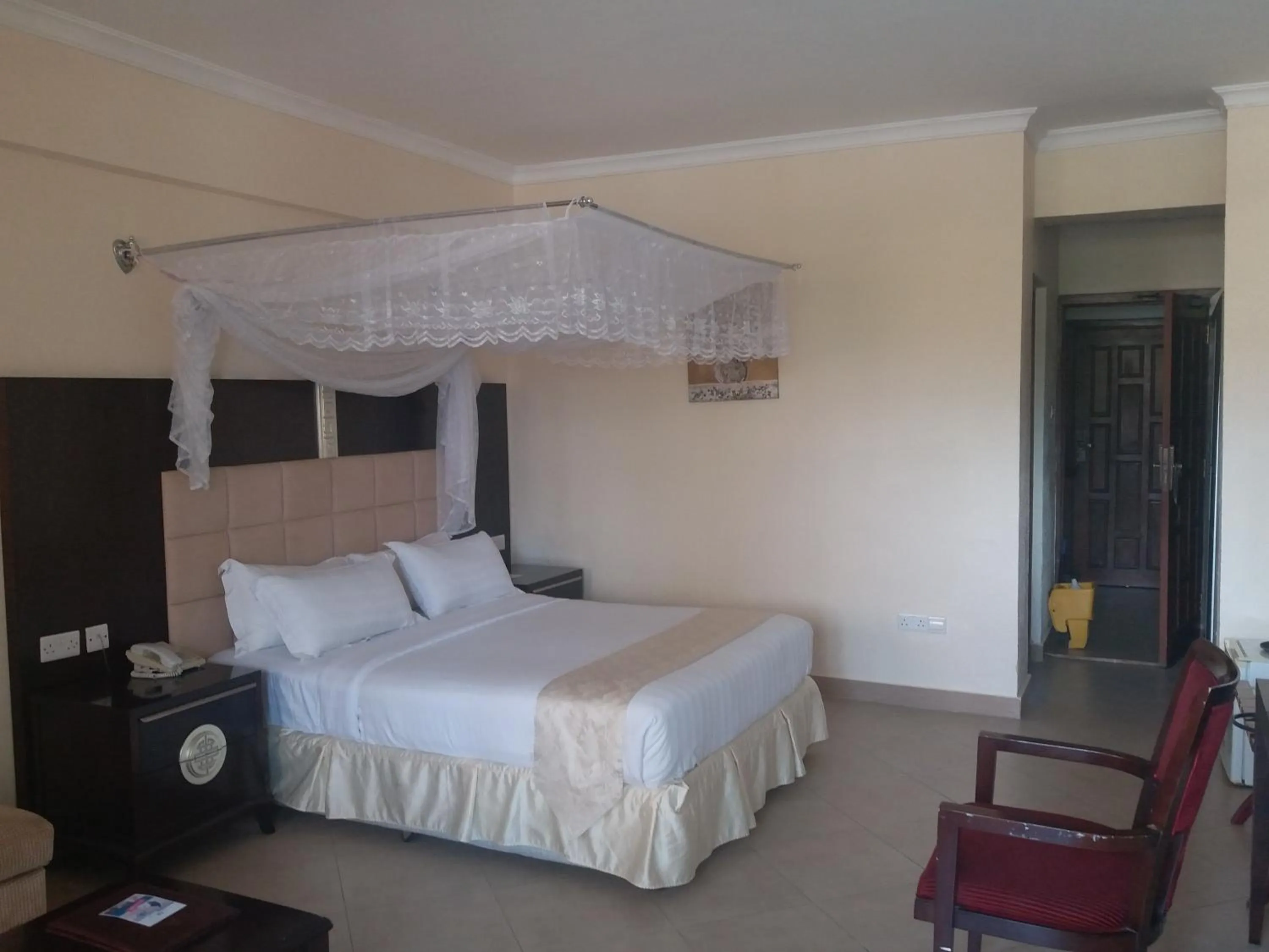 Bed in Landmark Mbezi Beach Resort