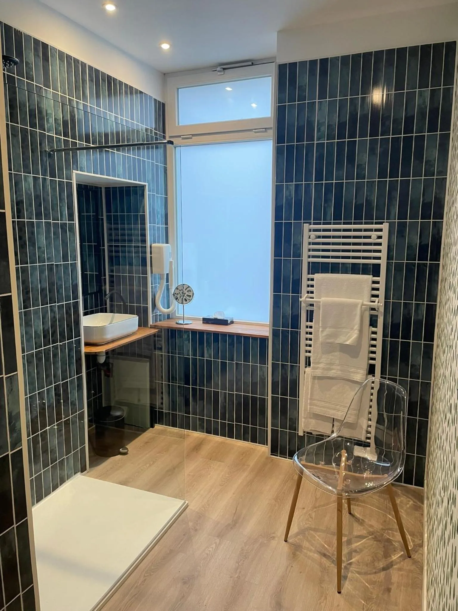 Bathroom in Nouvel Hôtel & Appartements