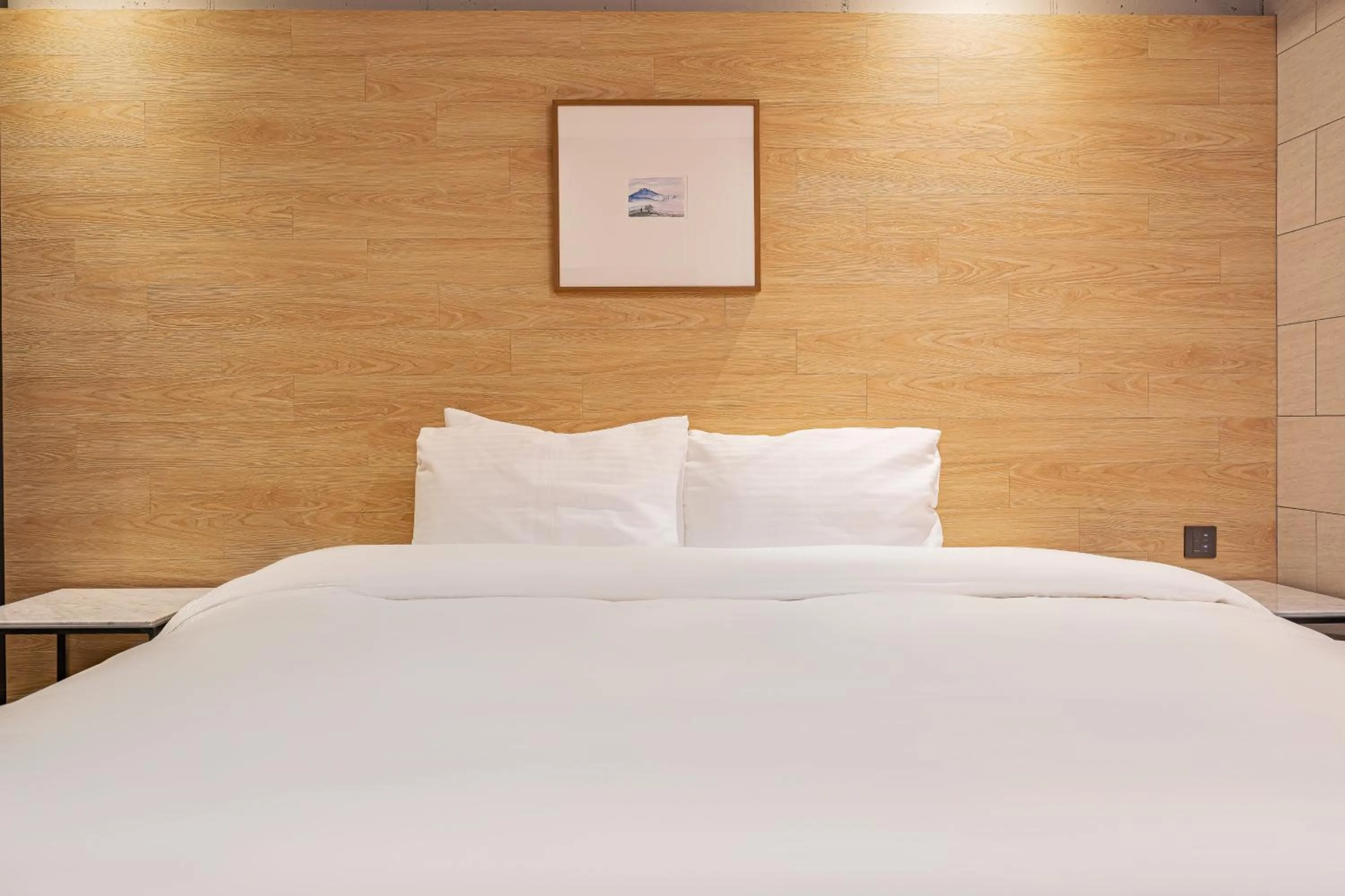 Bed in The Hong C Hotel