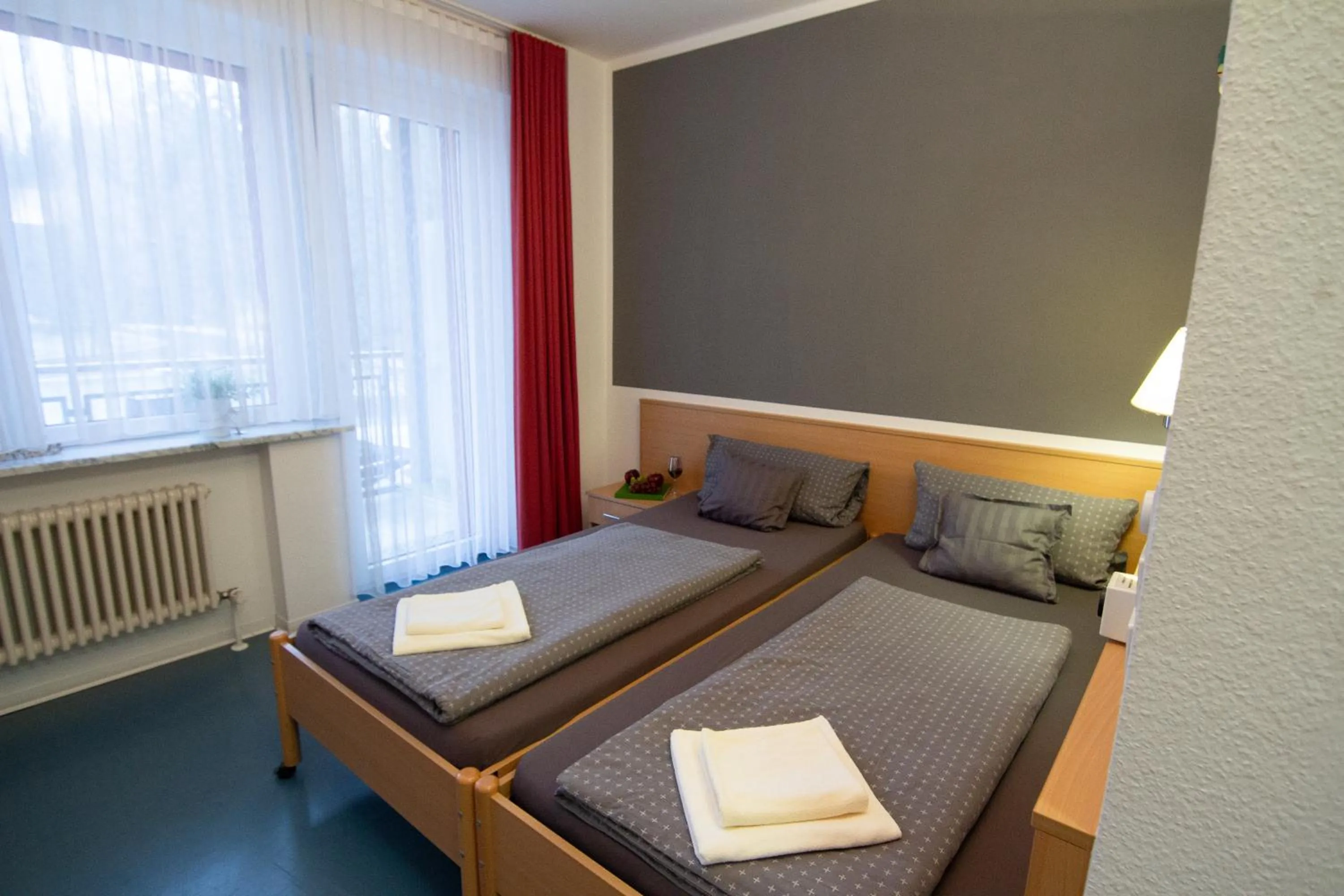 Bed in Green Night Hotel