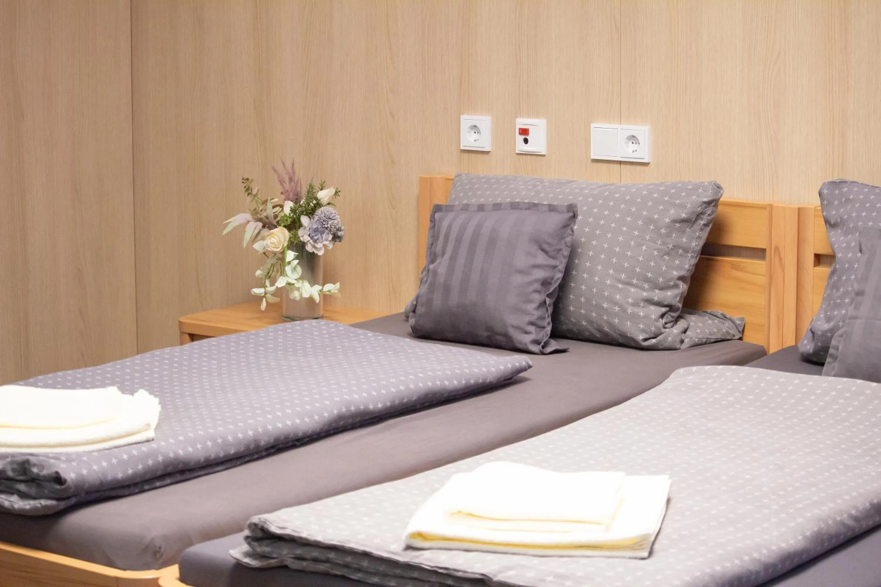 Bed in Green Night Hotel