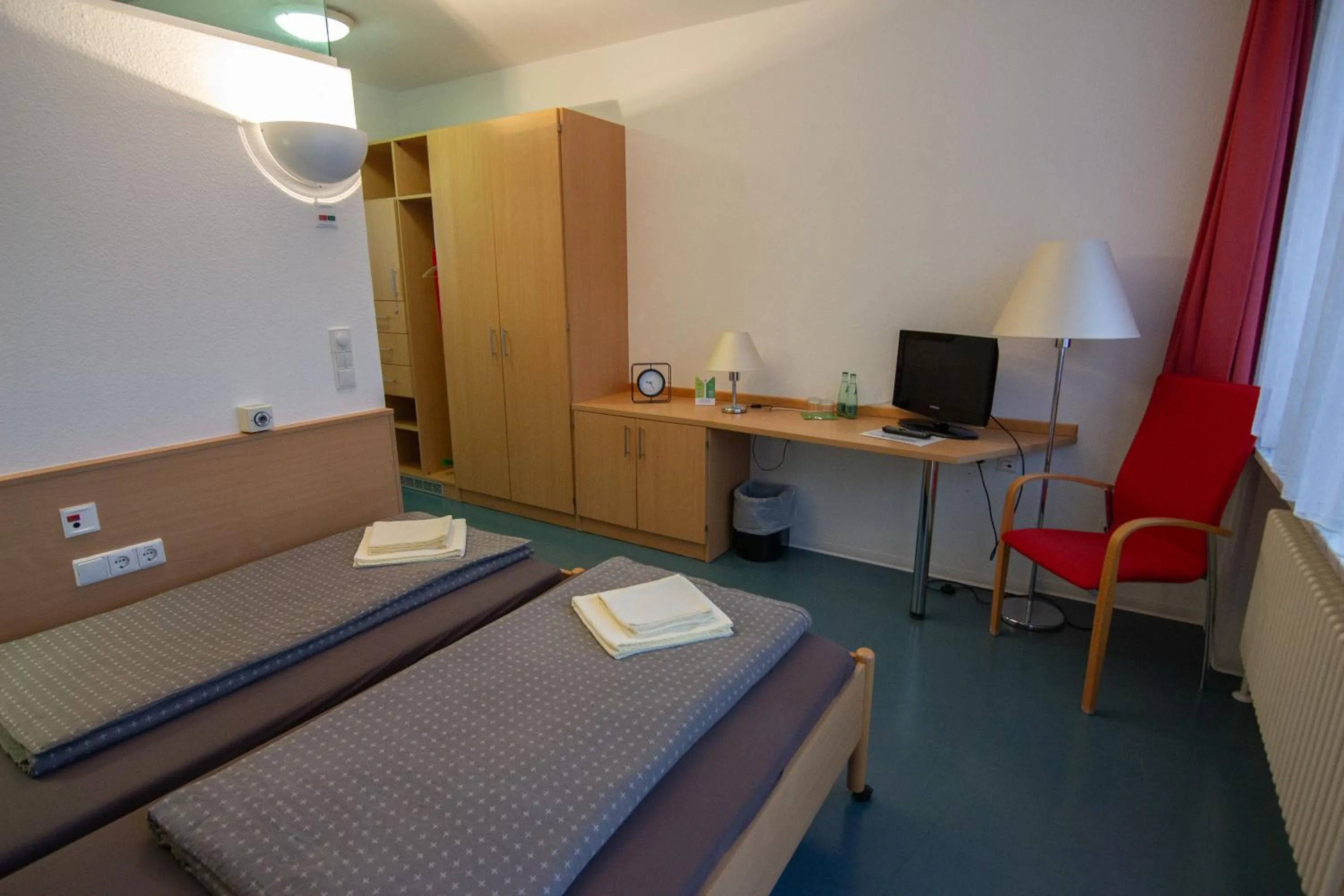 Bed in Green Night Hotel