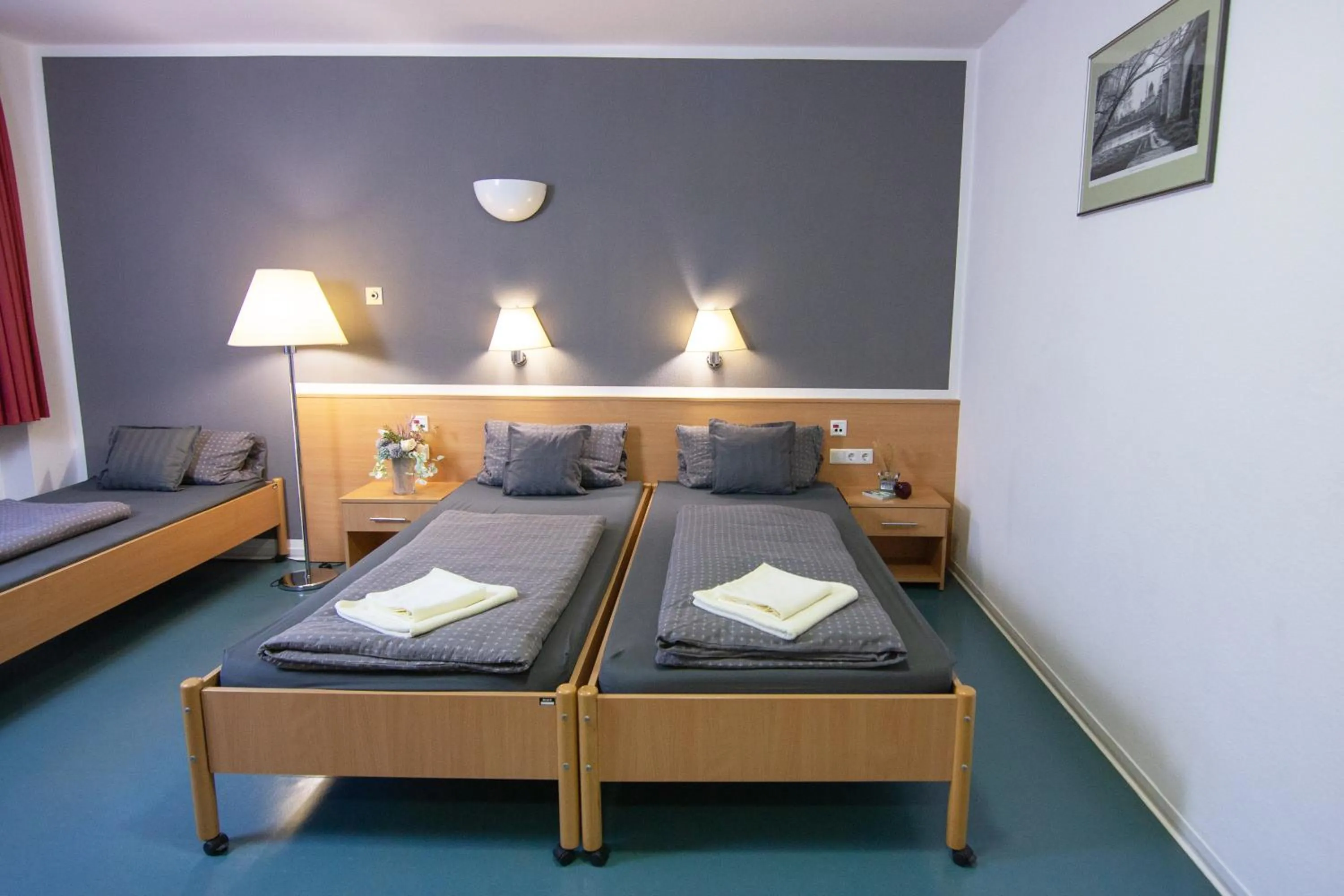 Bed in Green Night Hotel