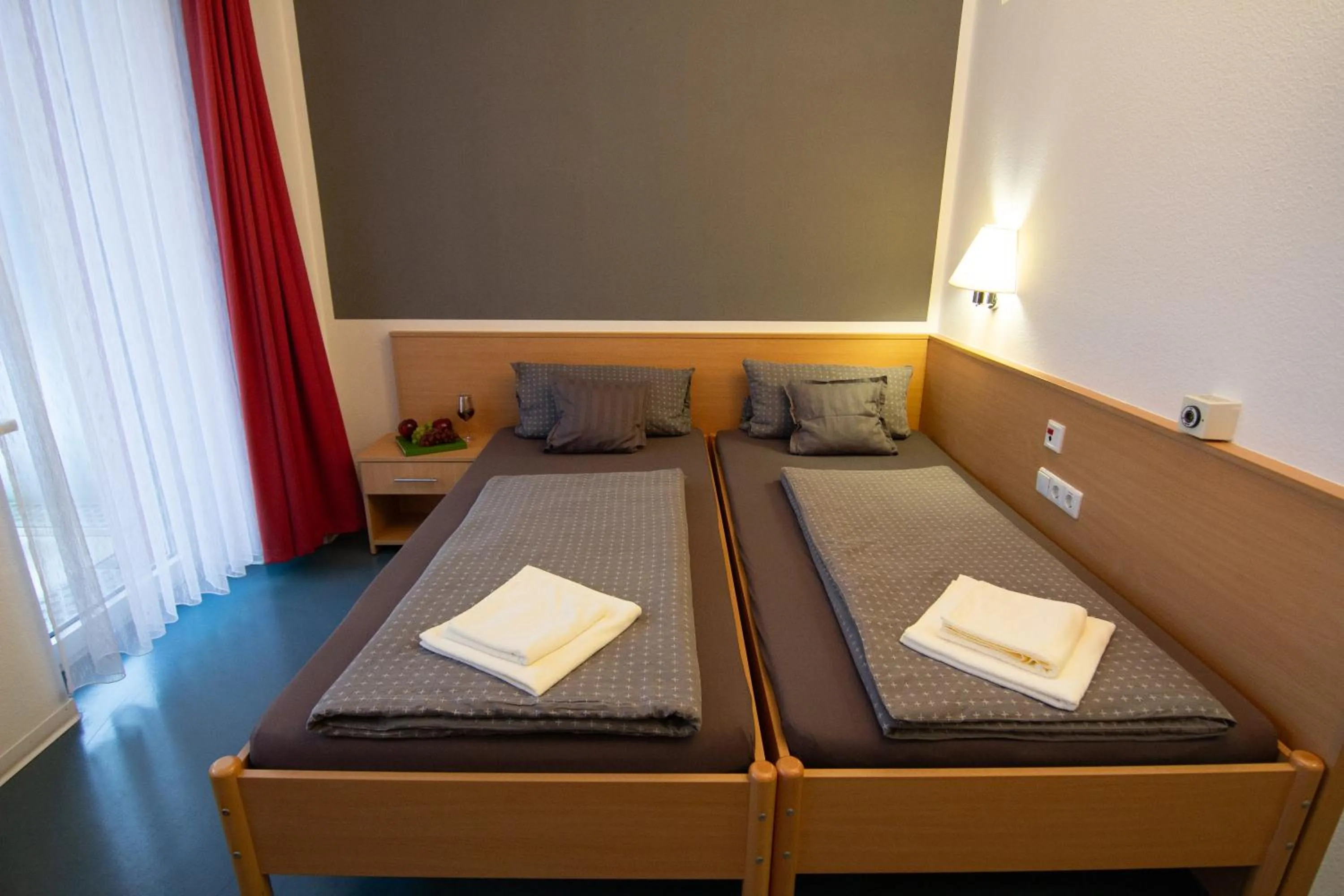 Bed in Green Night Hotel