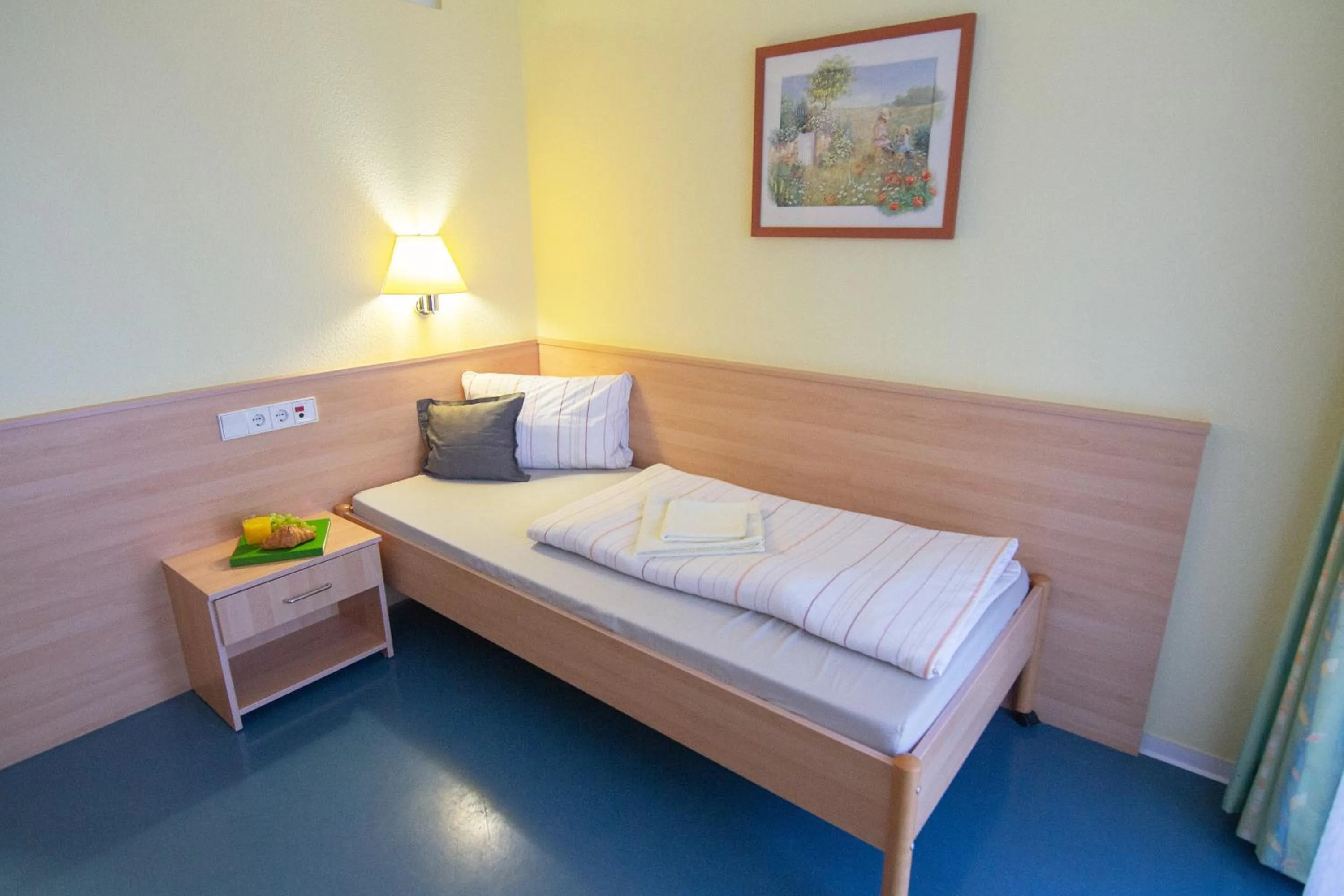 Bed in Green Night Hotel