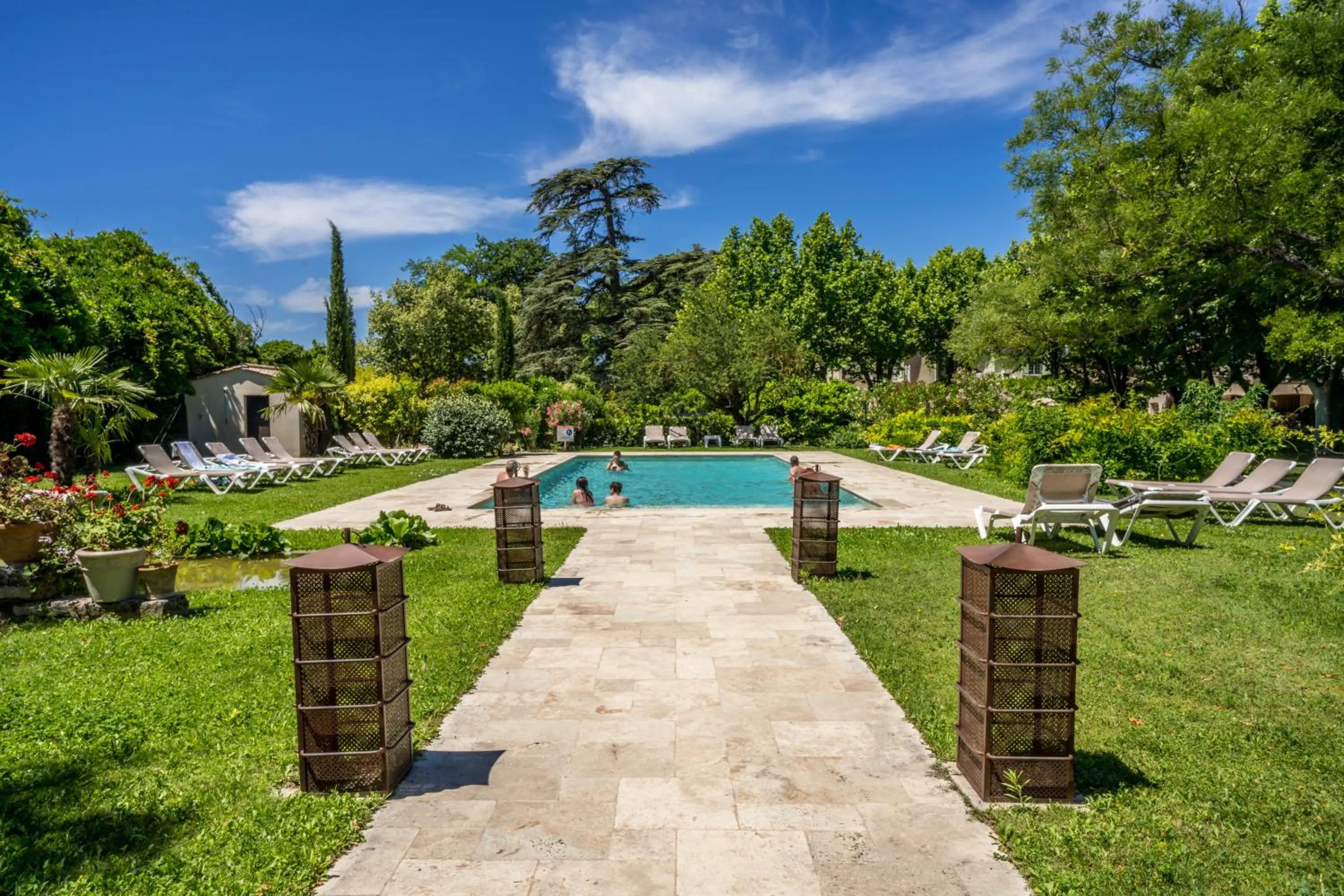 Pool view in Demeures et Châteaux Hôtel L'Hermitage