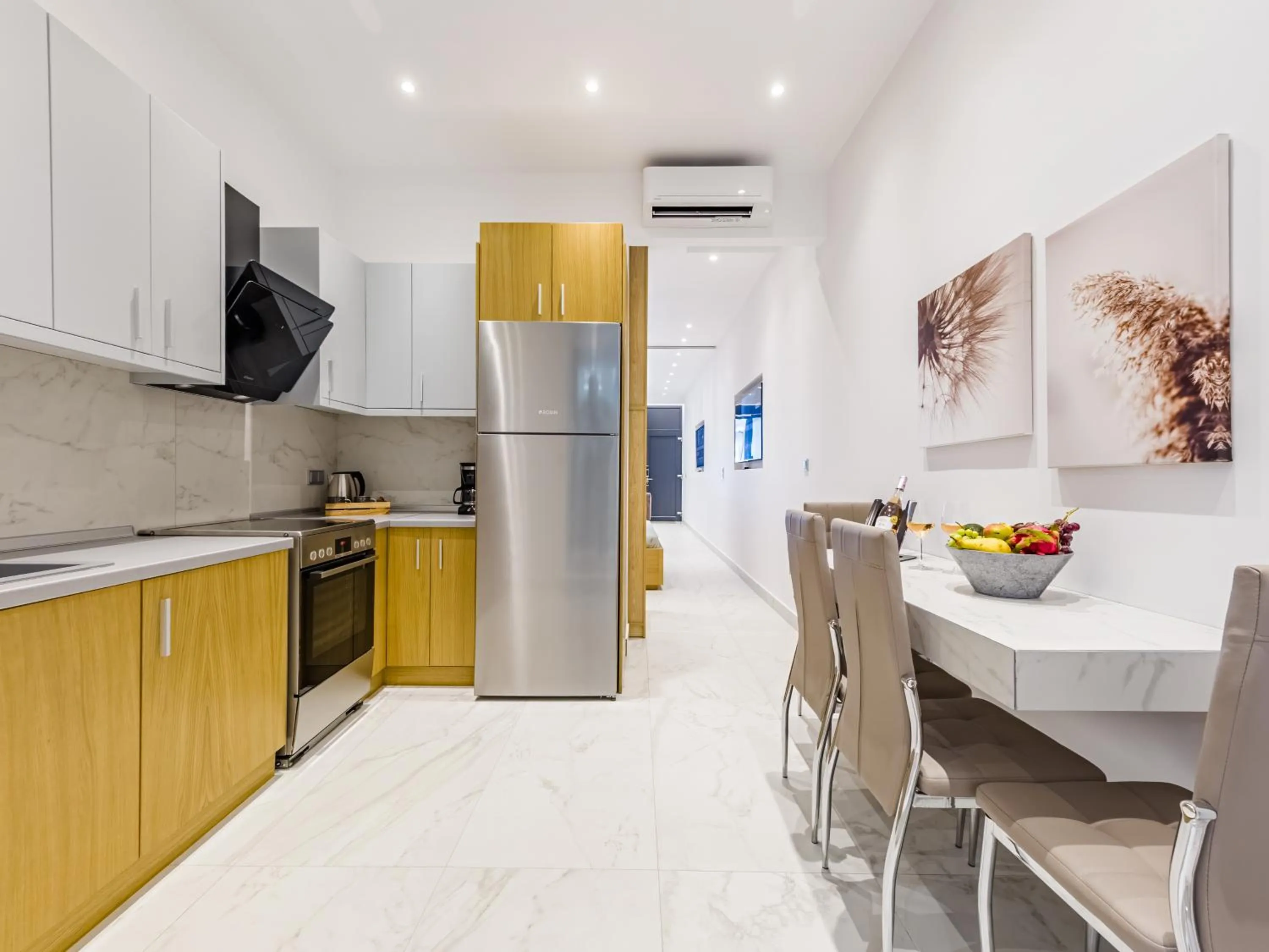 Kitchen or kitchenette in Kima Premium Apartments