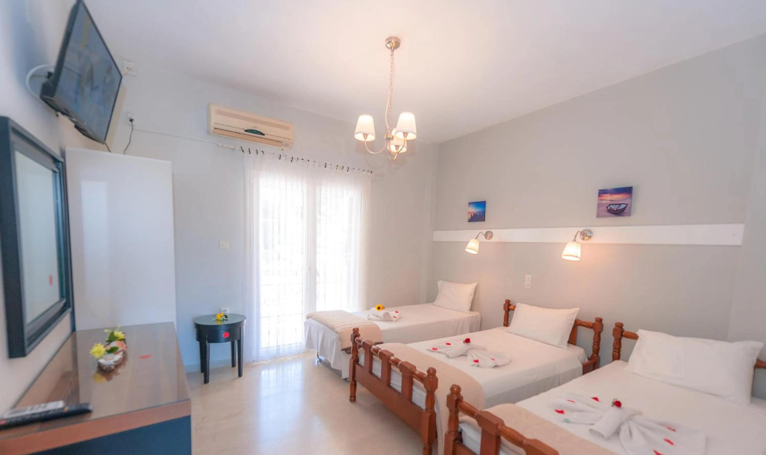 Bed in Vassilis Paradise Garden Aparthotel