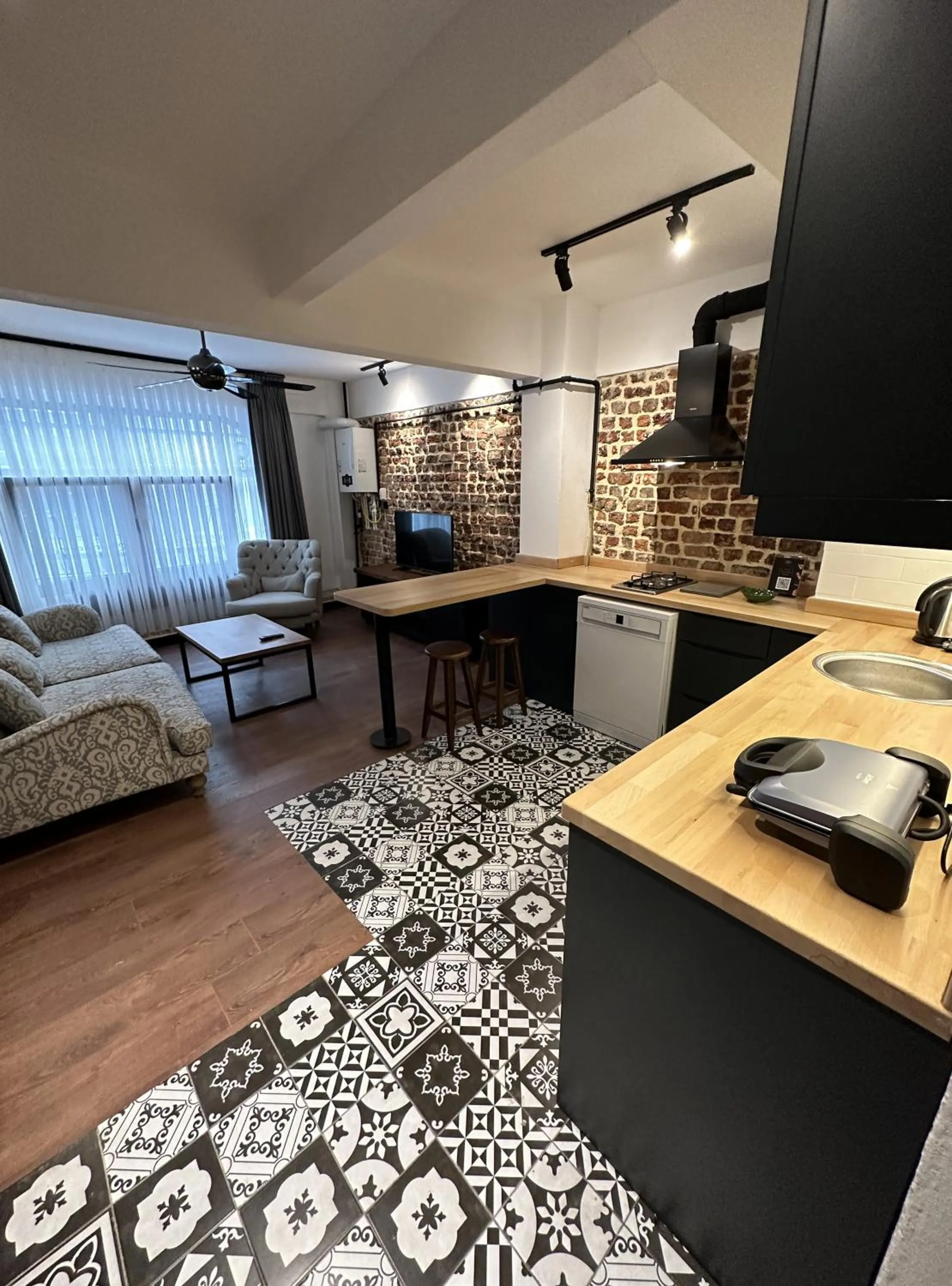 Living room in Alness Residence