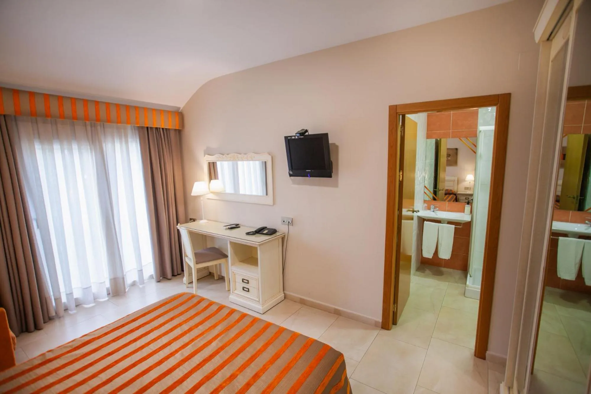 Bed in Hotel Versalles