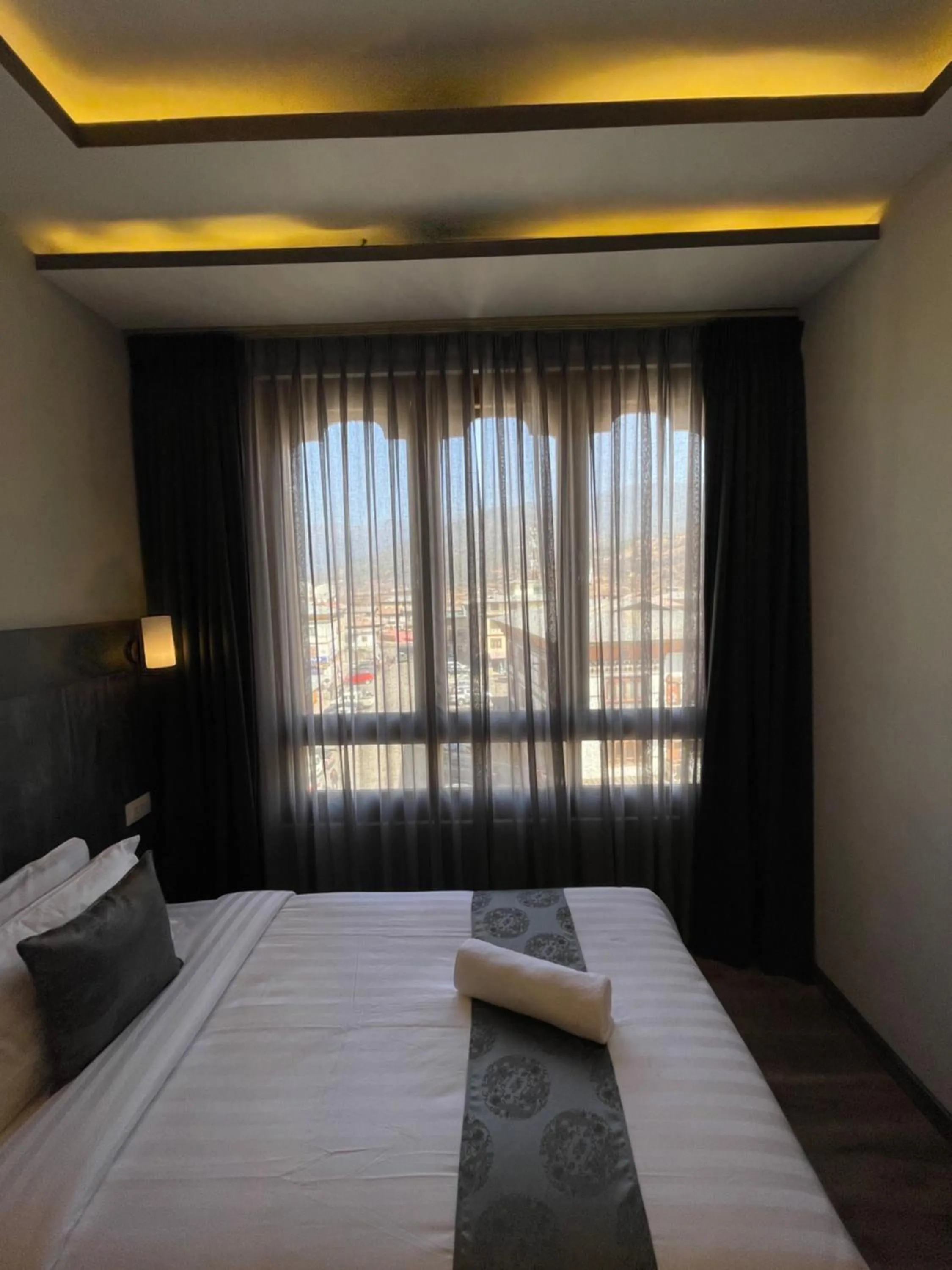 Bed in Yang Bhutan Hotel