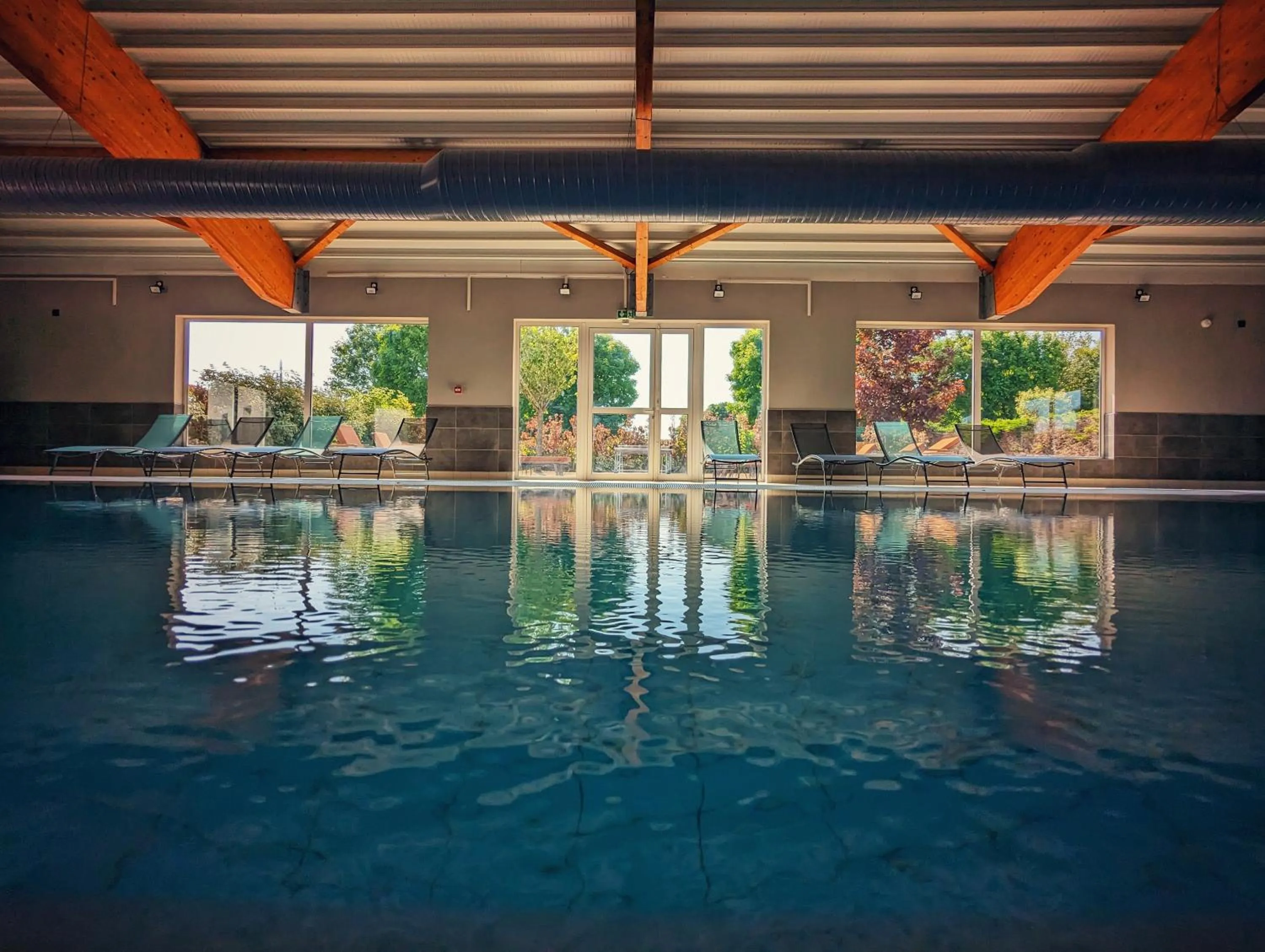 Pool view in Golden Tulip Dieppe Hôtel & Spa