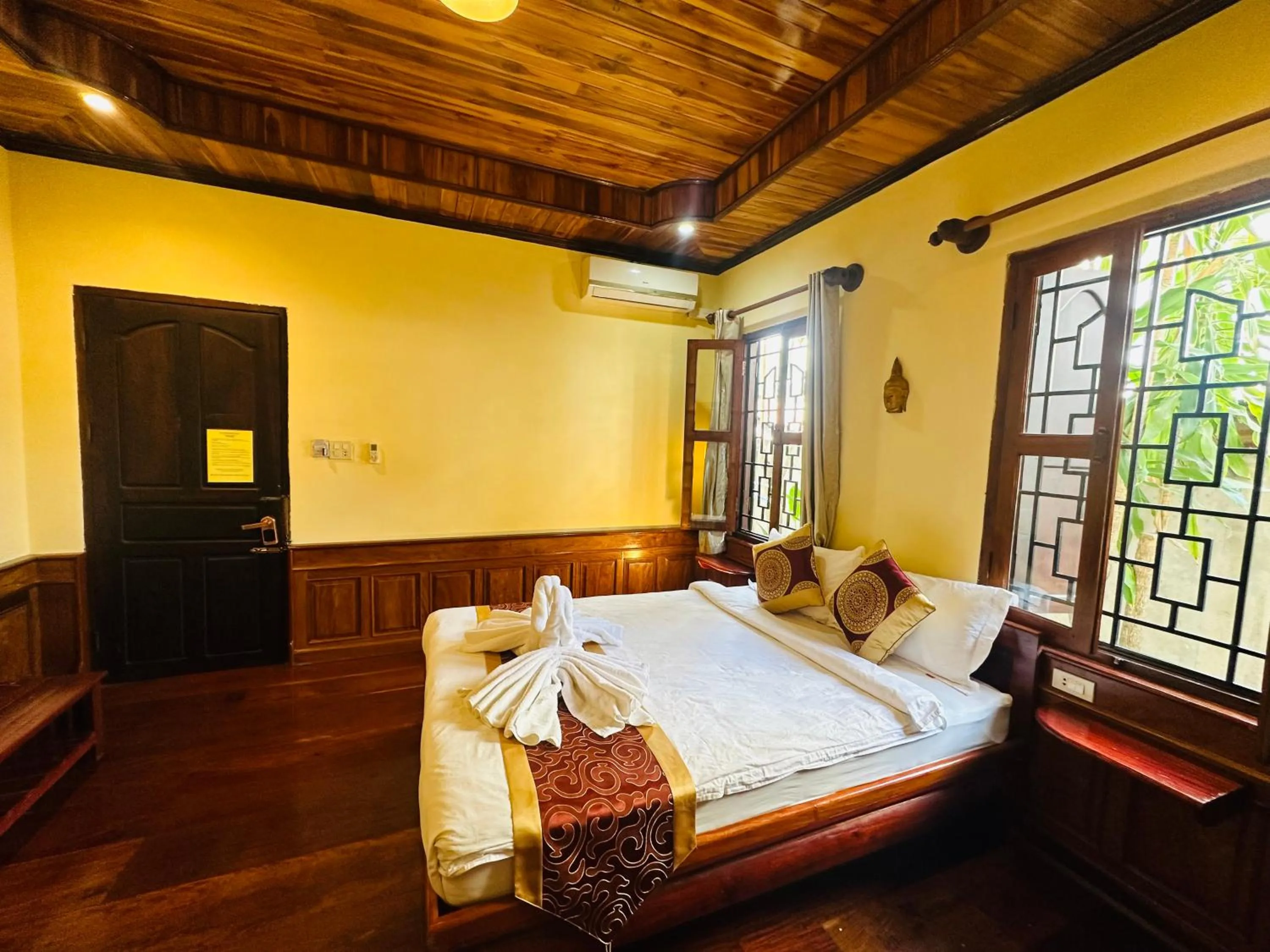 Bed in Ammata Boutique Villa