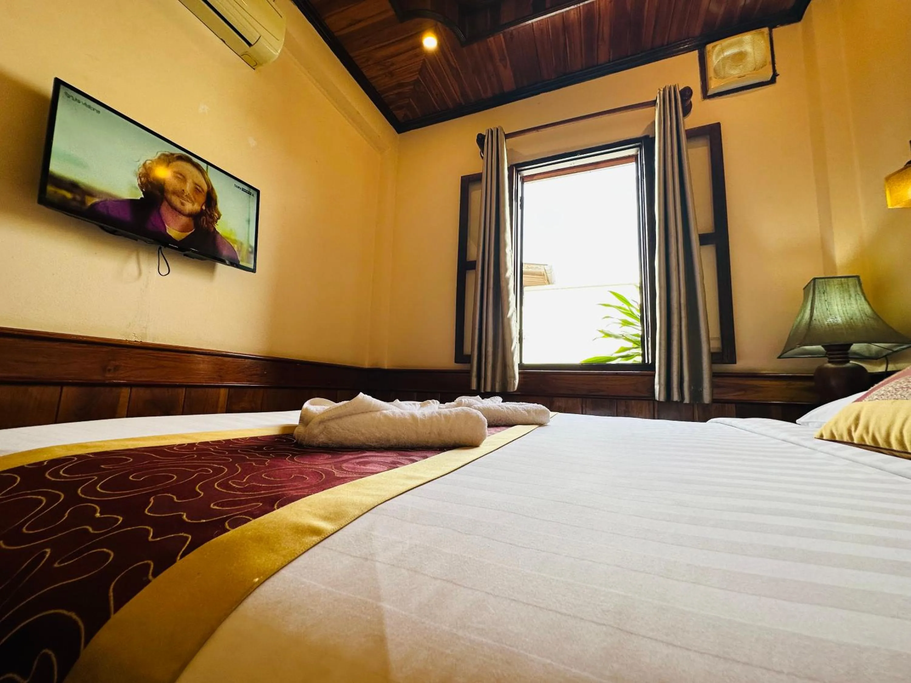Bed in Ammata Boutique Villa