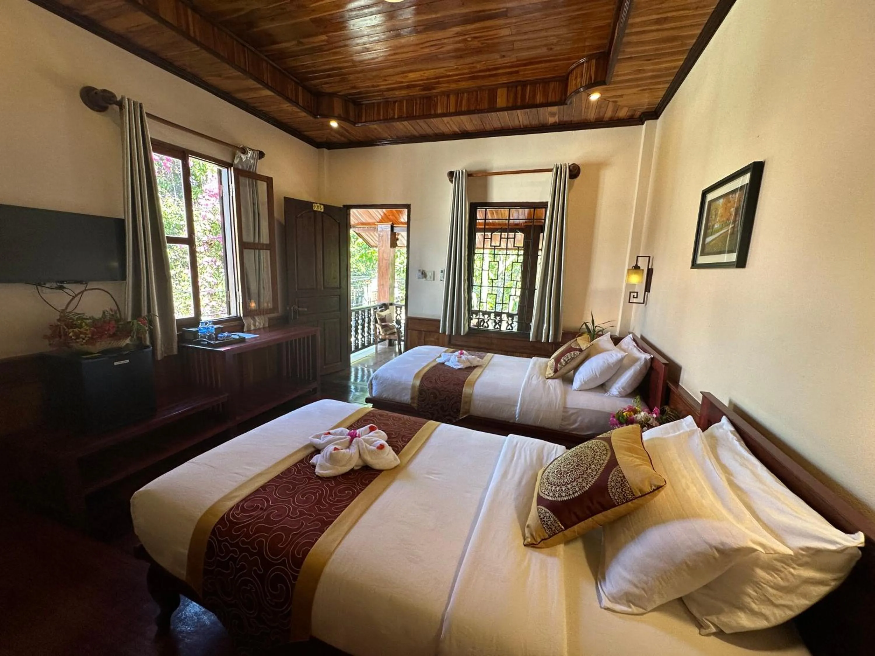 Bed in Ammata Boutique Villa