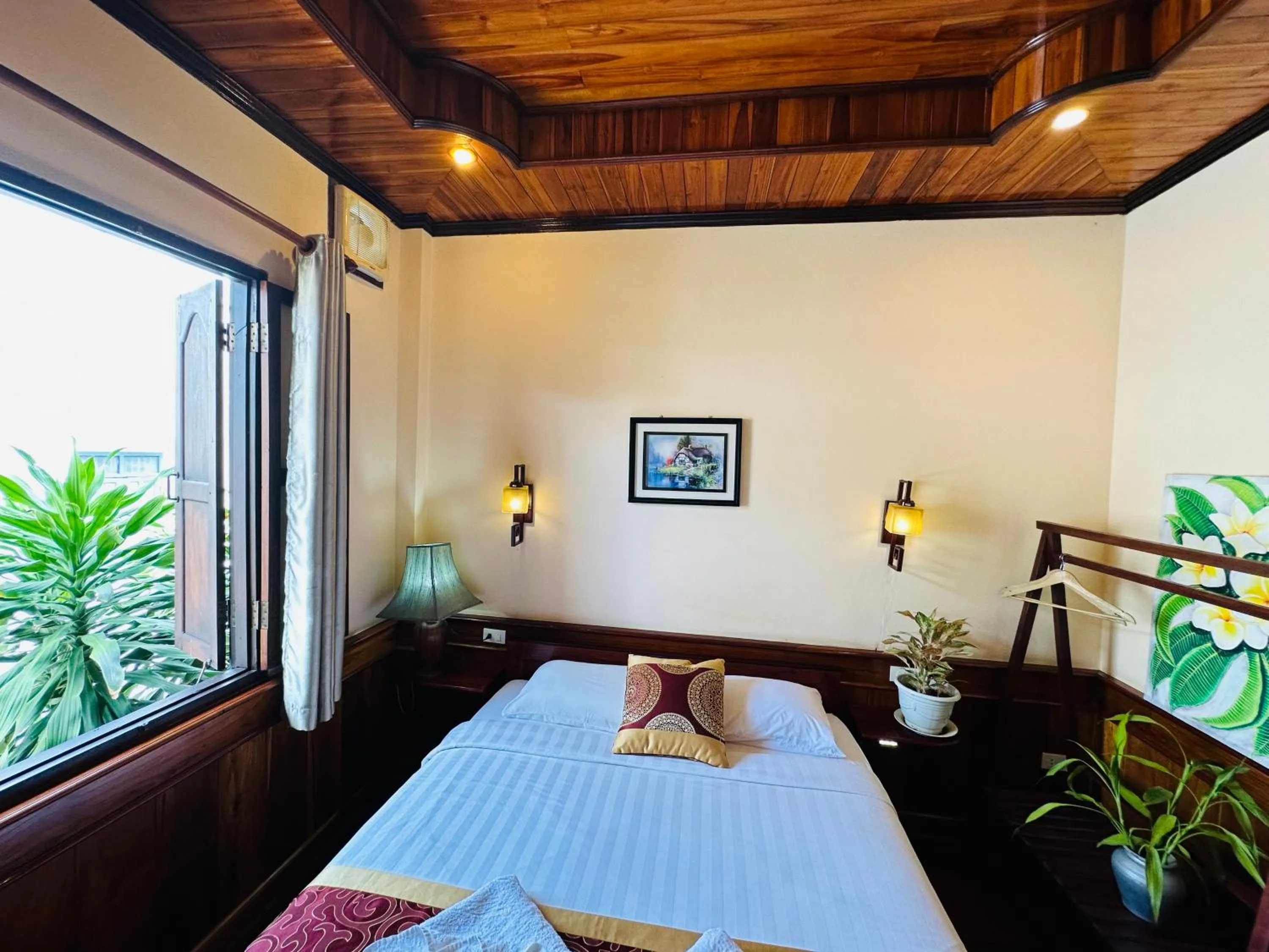 Bed in Ammata Boutique Villa