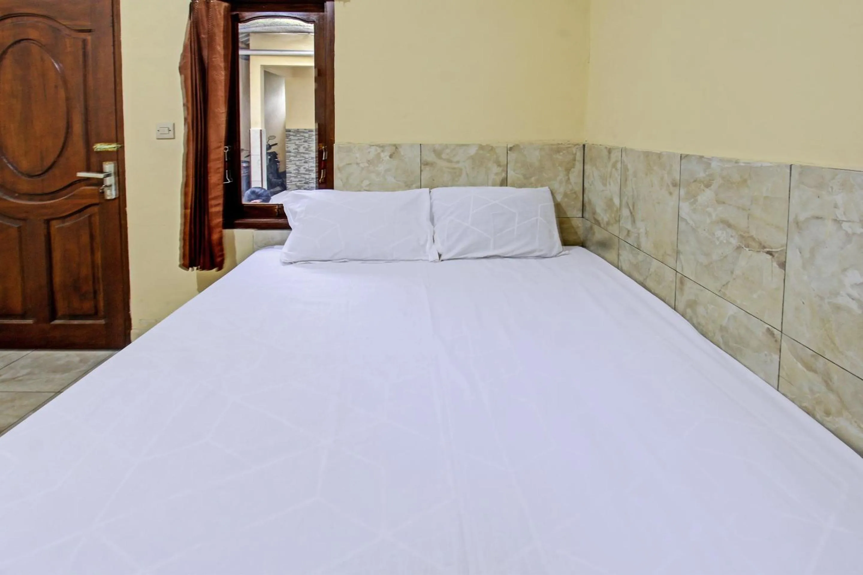 Bedroom, Bed in Hotel O Inn Homestay