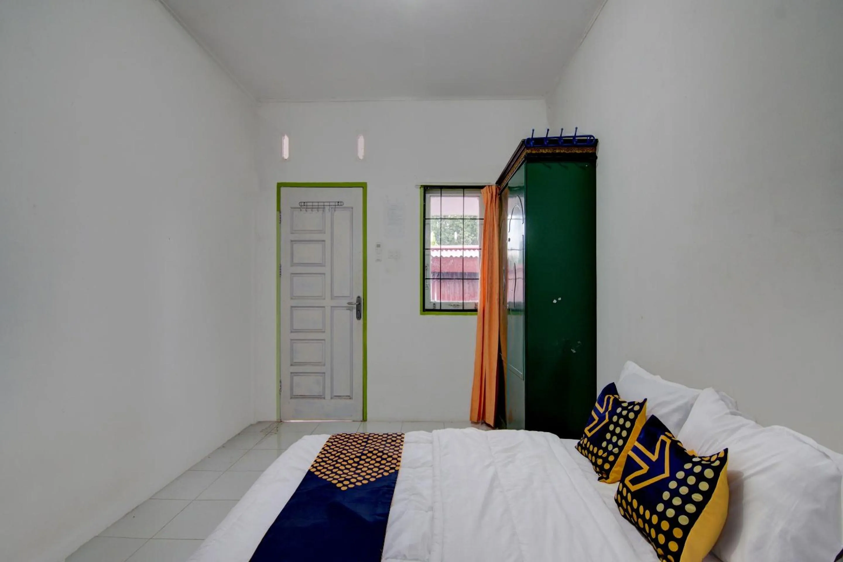 Bedroom, Bed in Hotel O Homestay Baiturrahmah Syariah