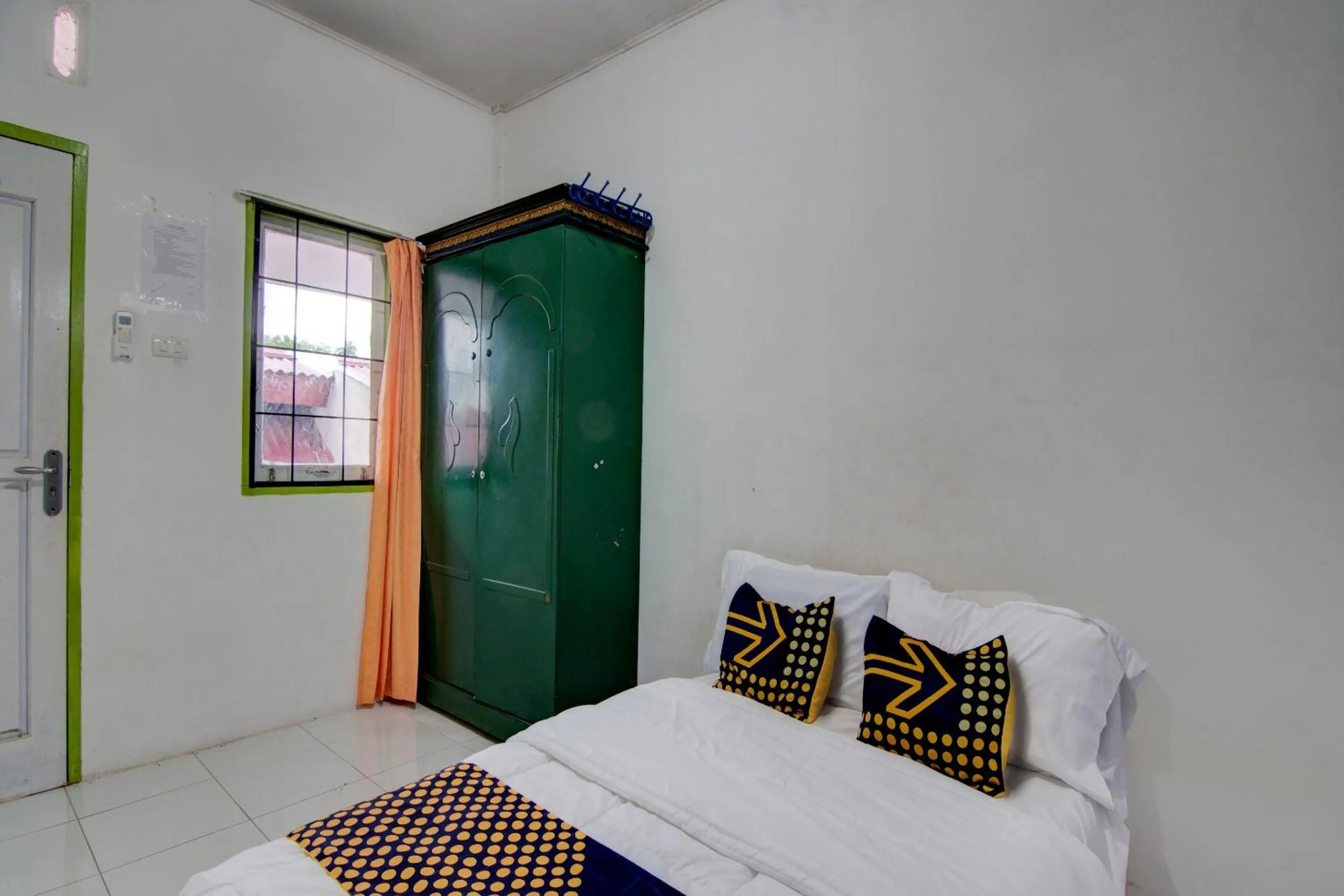 Bedroom, Bed in Hotel O Homestay Baiturrahmah Syariah