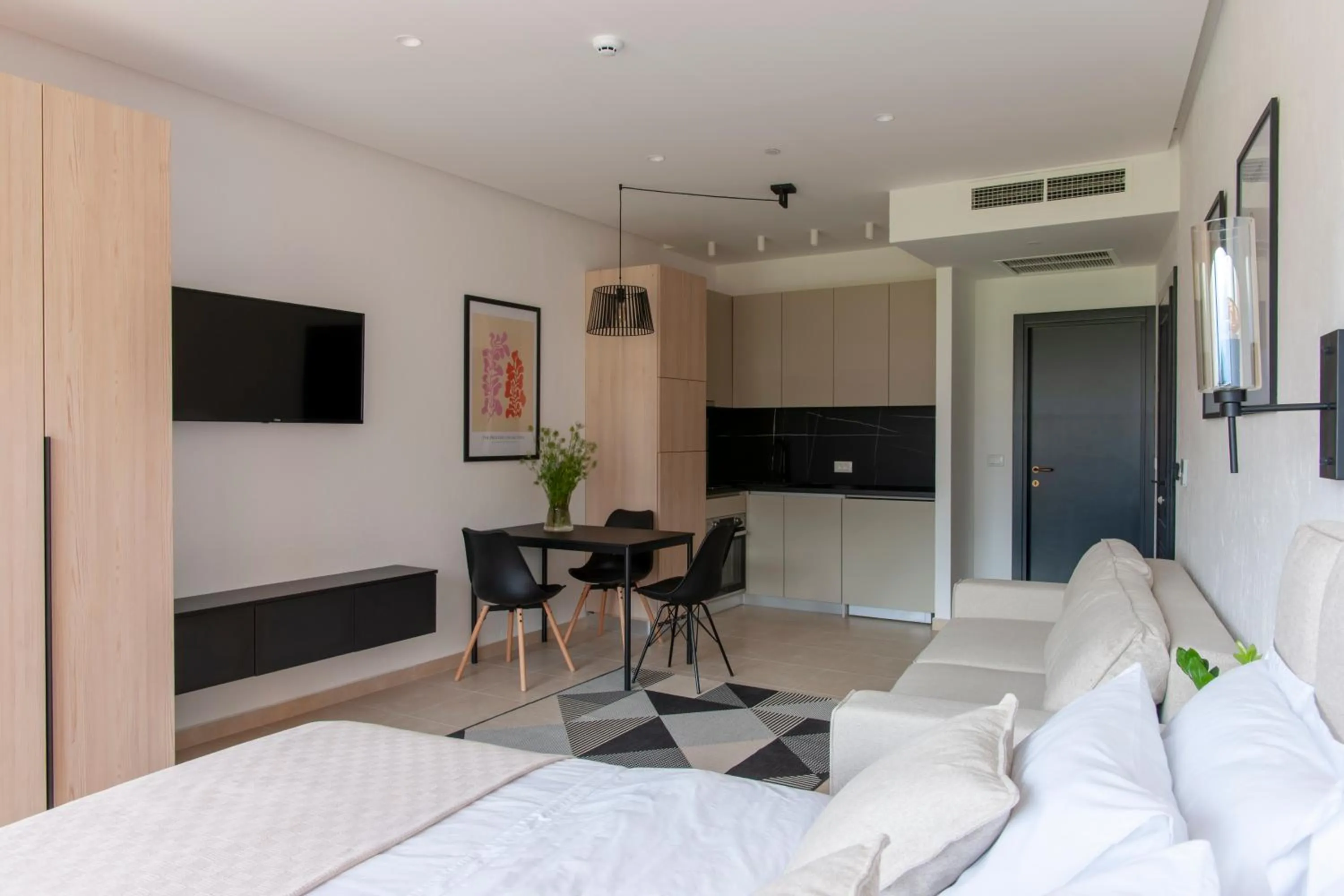 Photo of the whole room, Bed in Soho Suites