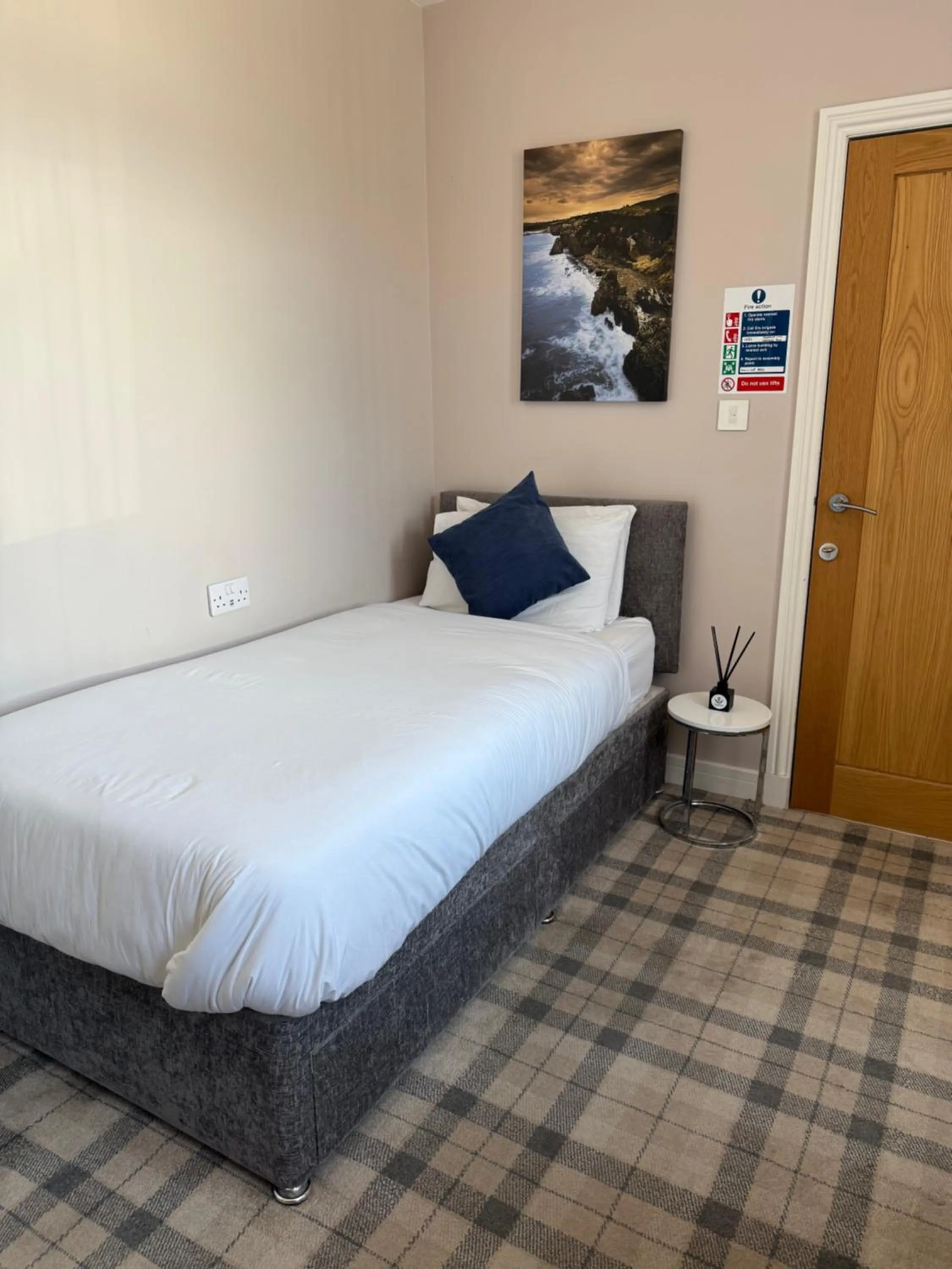 Bedroom in Poseidon Inn