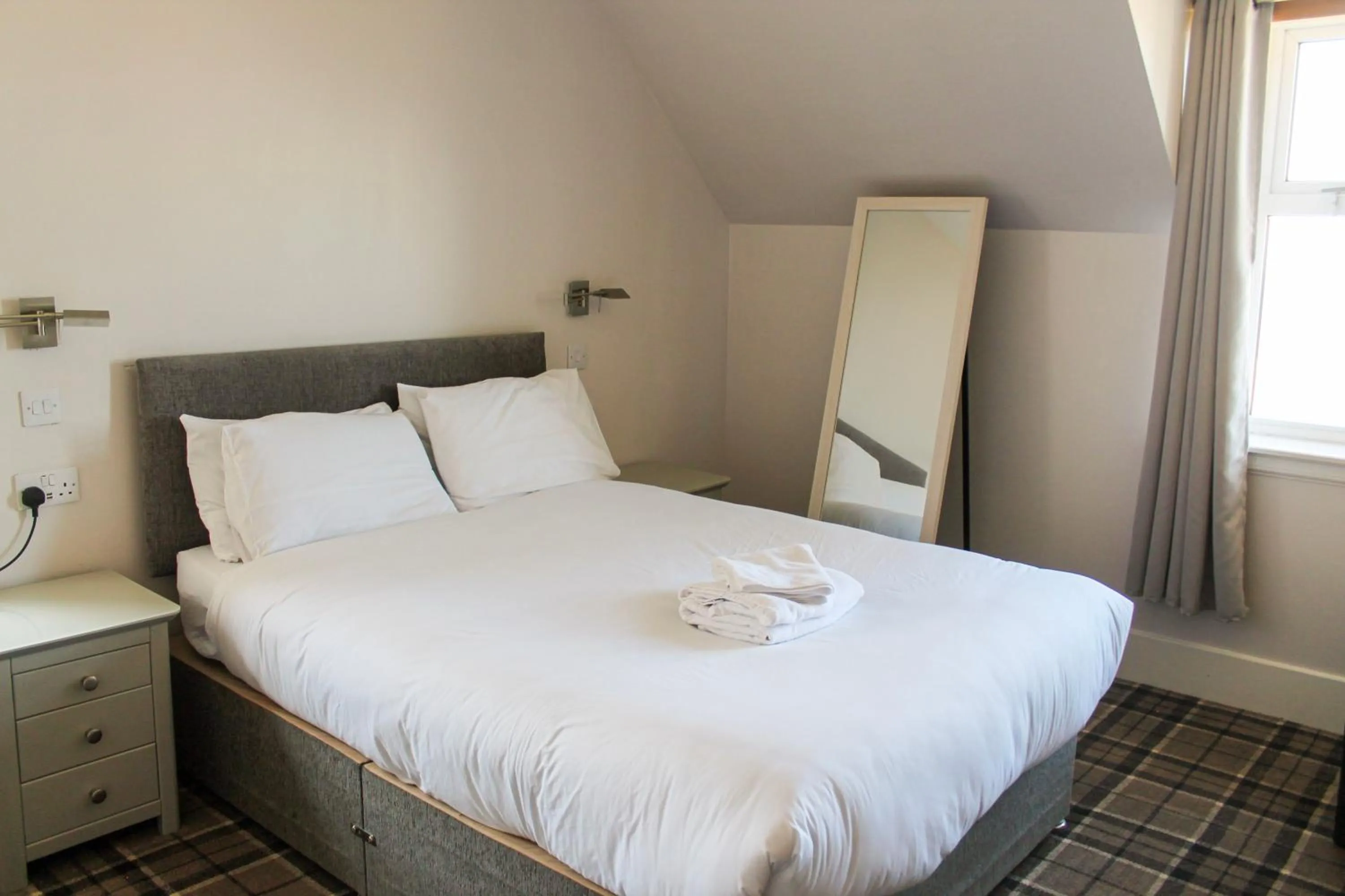 Bedroom in Poseidon Inn