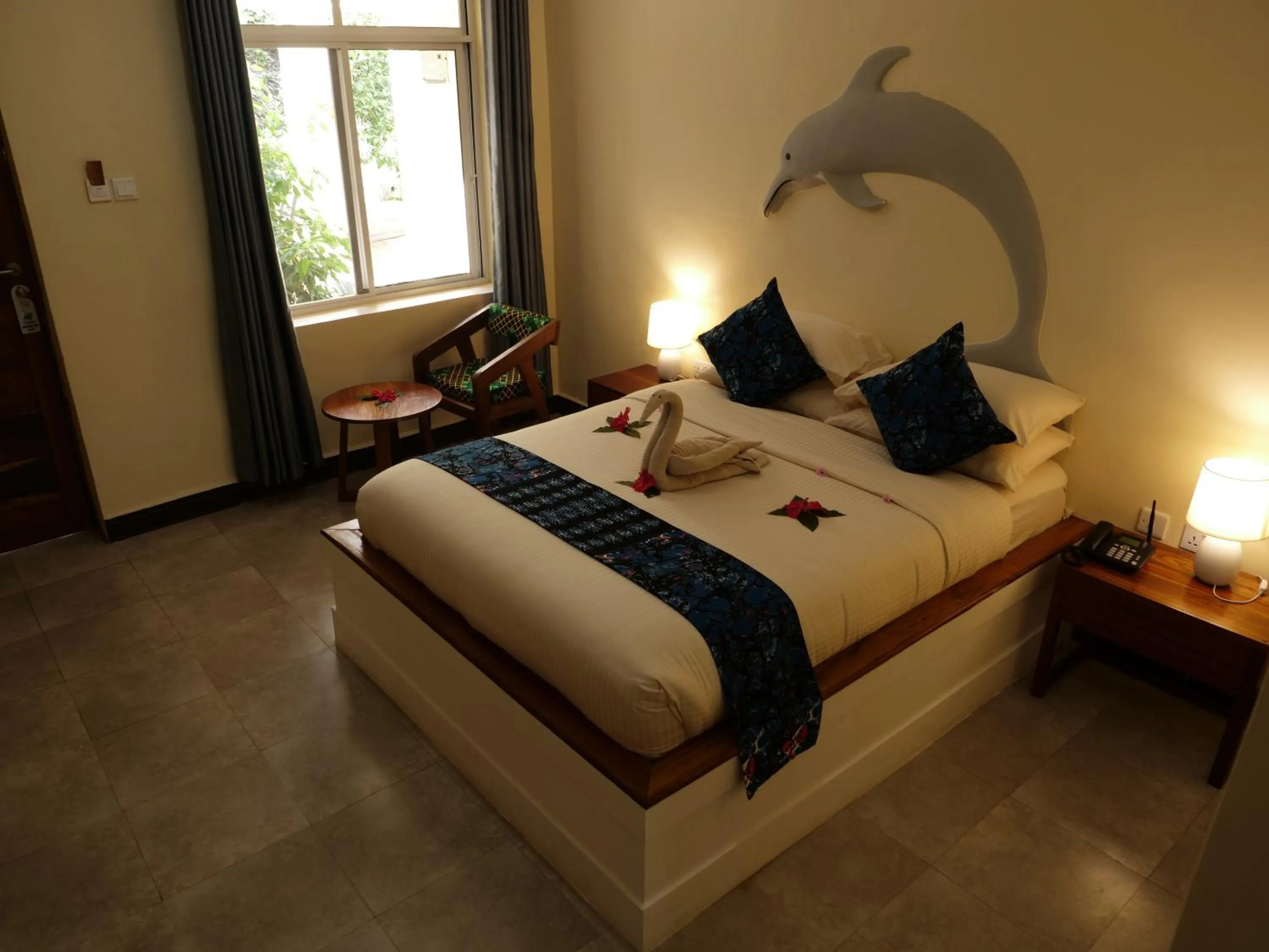 Bed in Double A Nungwi Beach Hotel