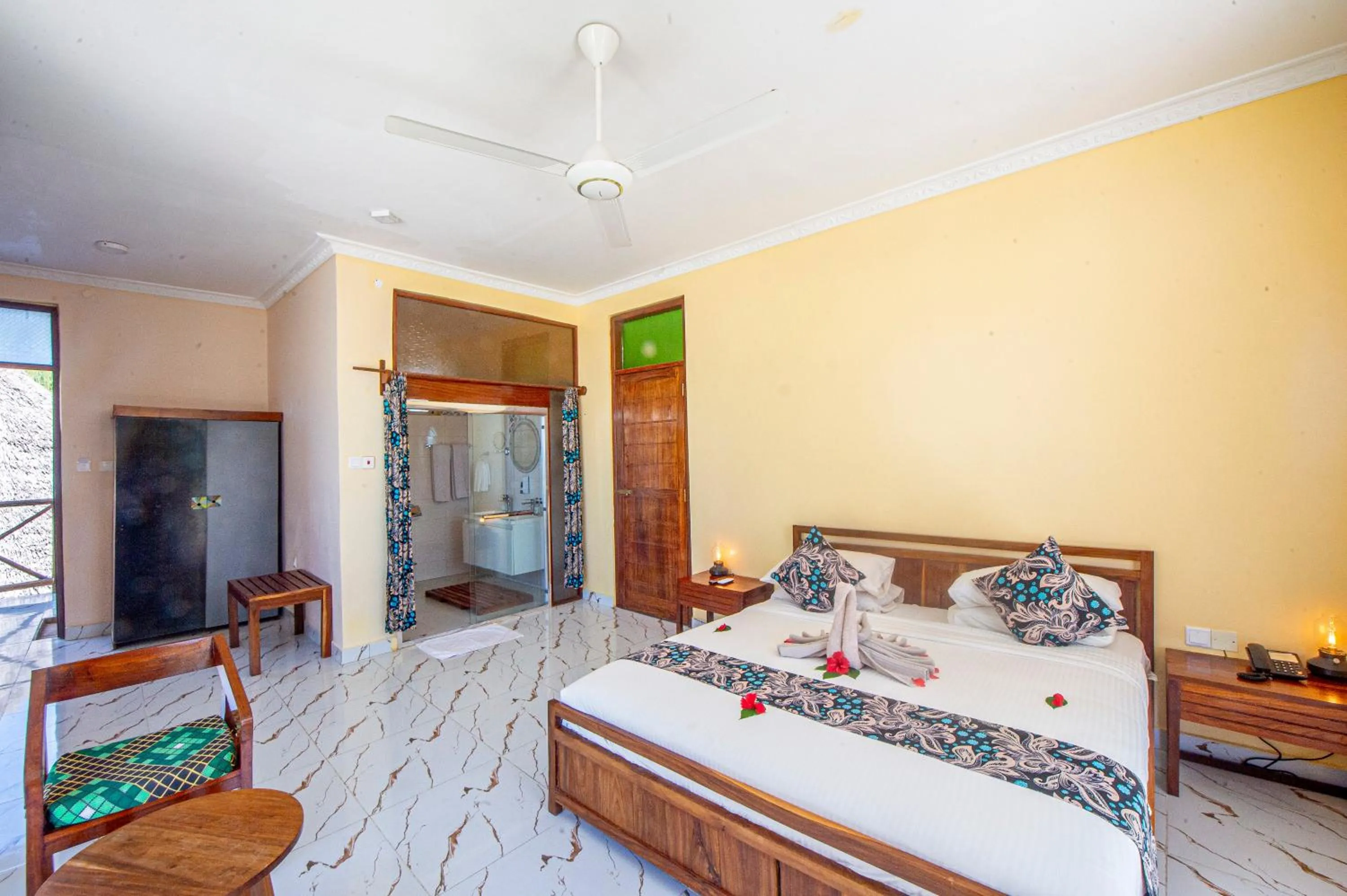 Bed in Double A Nungwi Beach Hotel