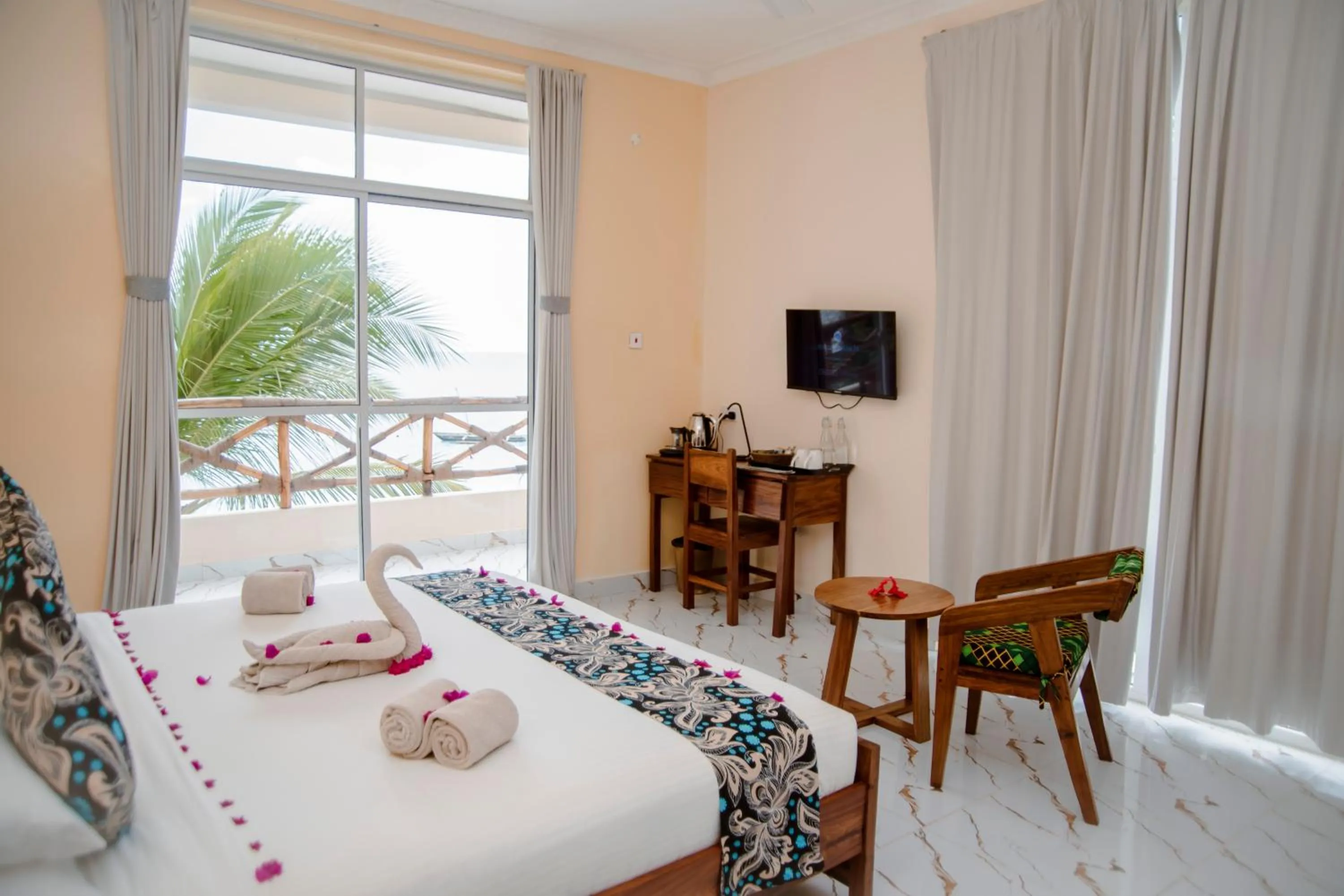 Bed in Double A Nungwi Beach Hotel