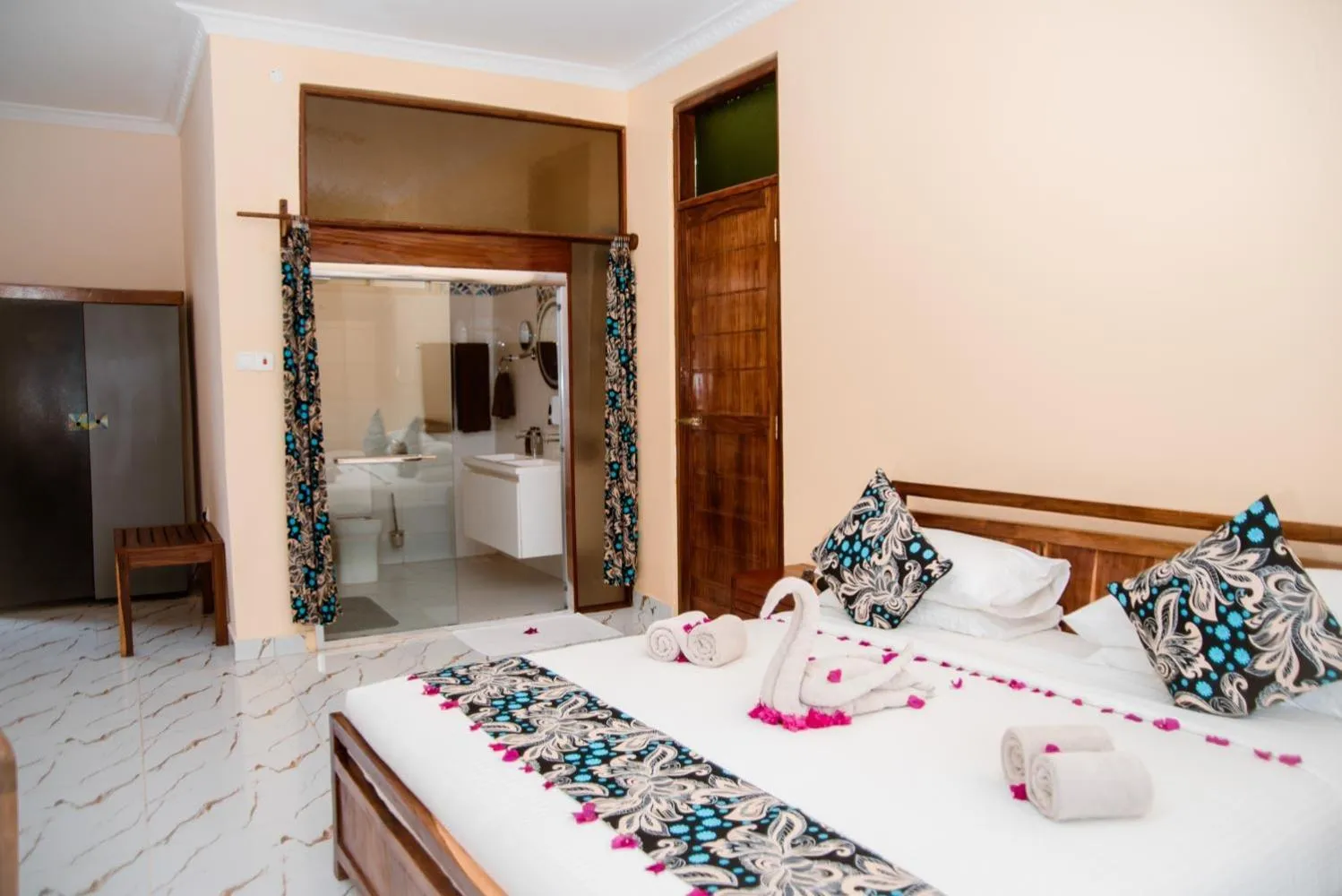 Bed in Double A Nungwi Beach Hotel