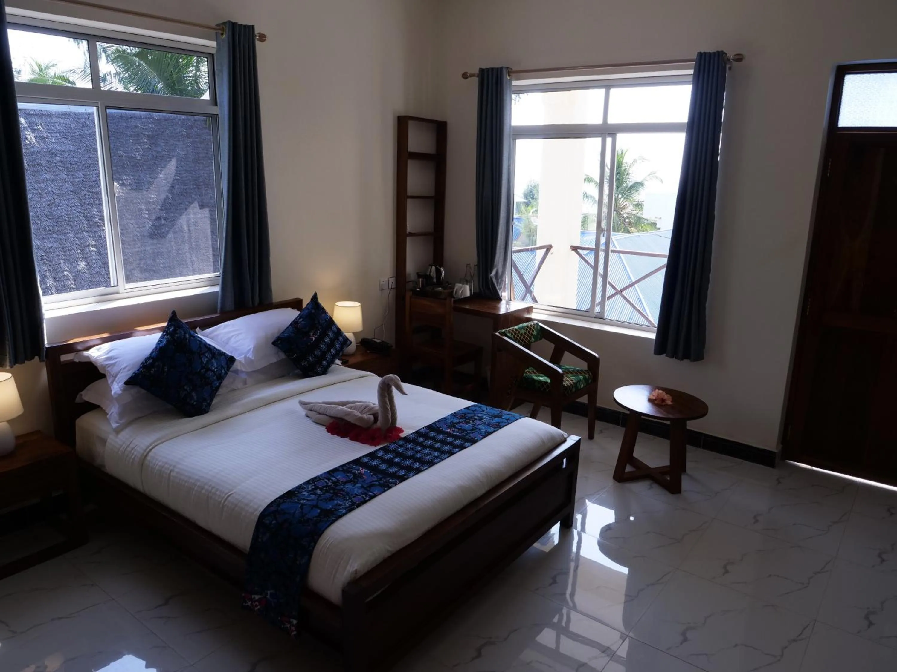 Bed in Double A Nungwi Beach Hotel