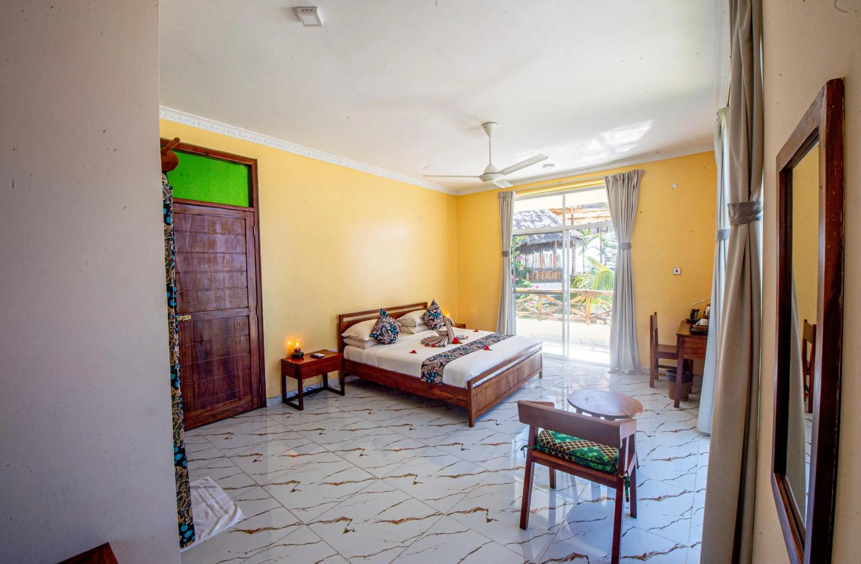 Bed in Double A Nungwi Beach Hotel