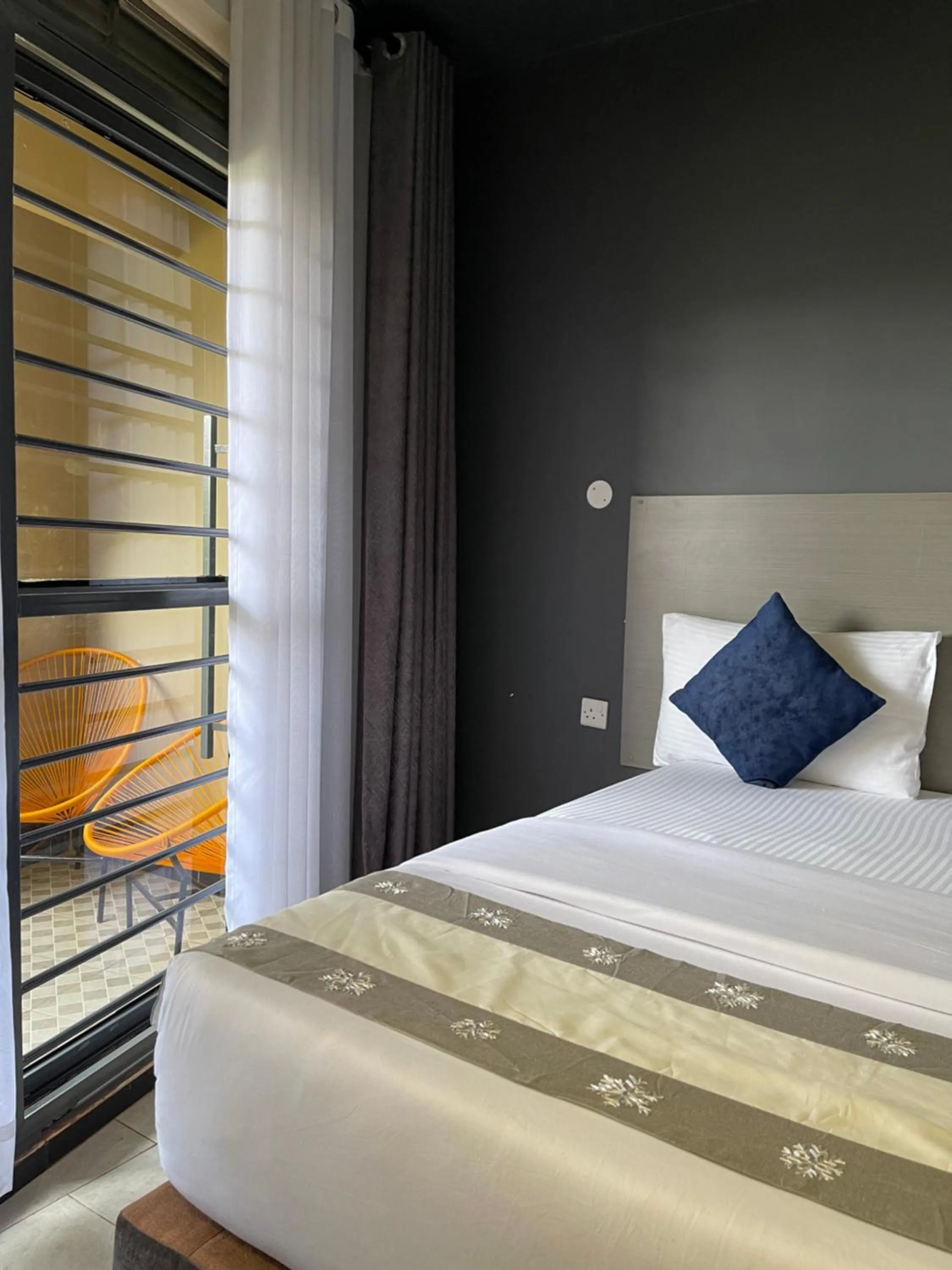 Bed in Ashleys Hotel