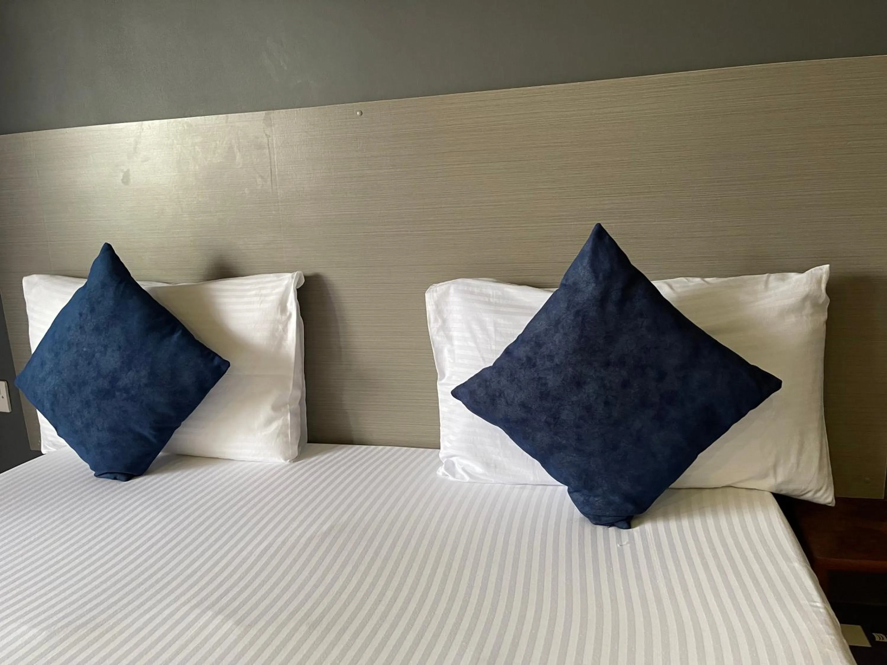 Bed in Ashleys Hotel