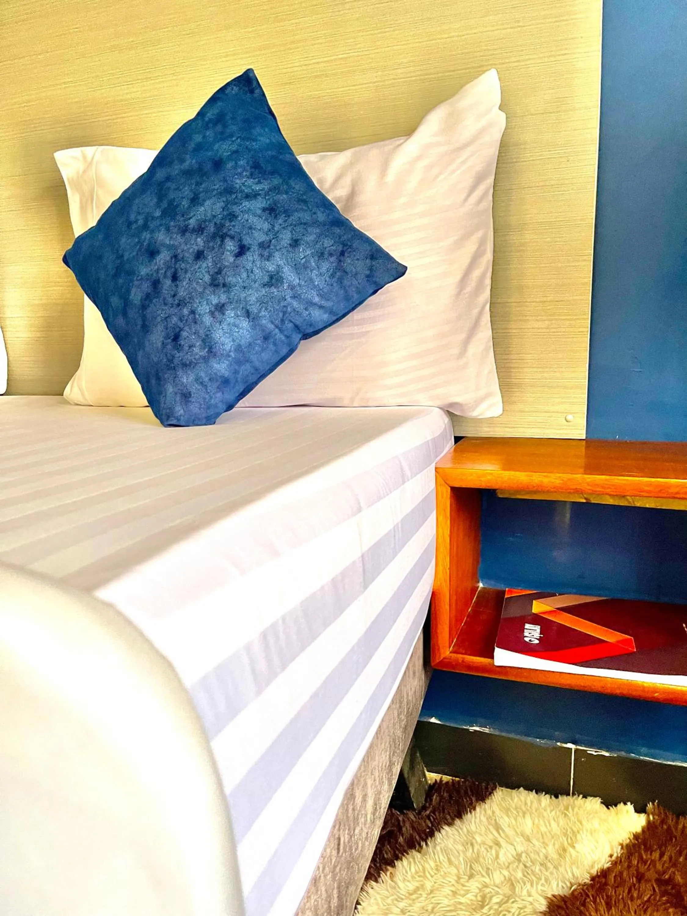 Bed in Ashleys Hotel